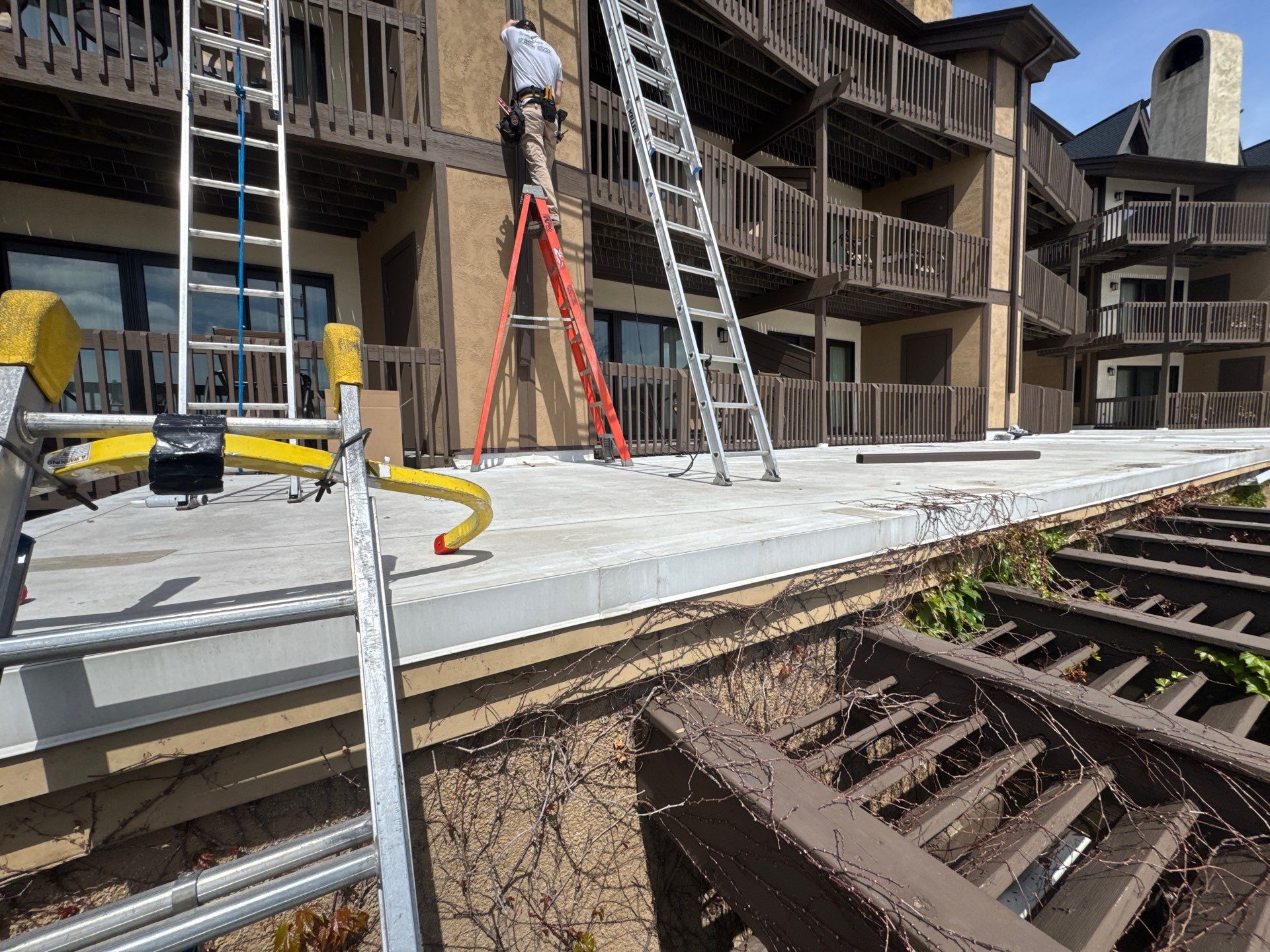 Gutter and Gutter Helmet Installation for Harbor Springs Hotel by Rainbow Seamless Systems