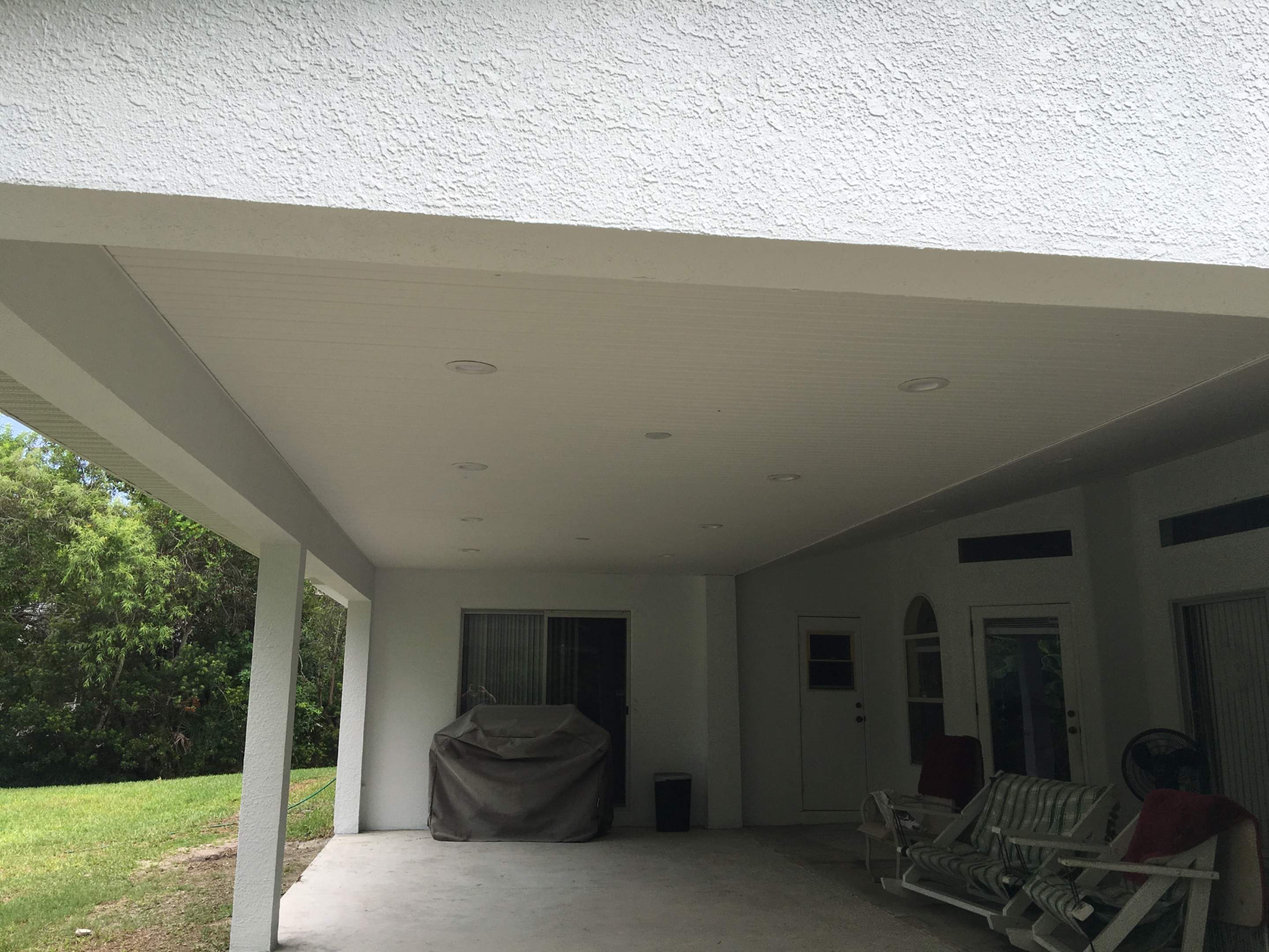 Covered Porch Extension and Structural Patio Addition in Melbourne by Florida Roofing and Renovations Inc.