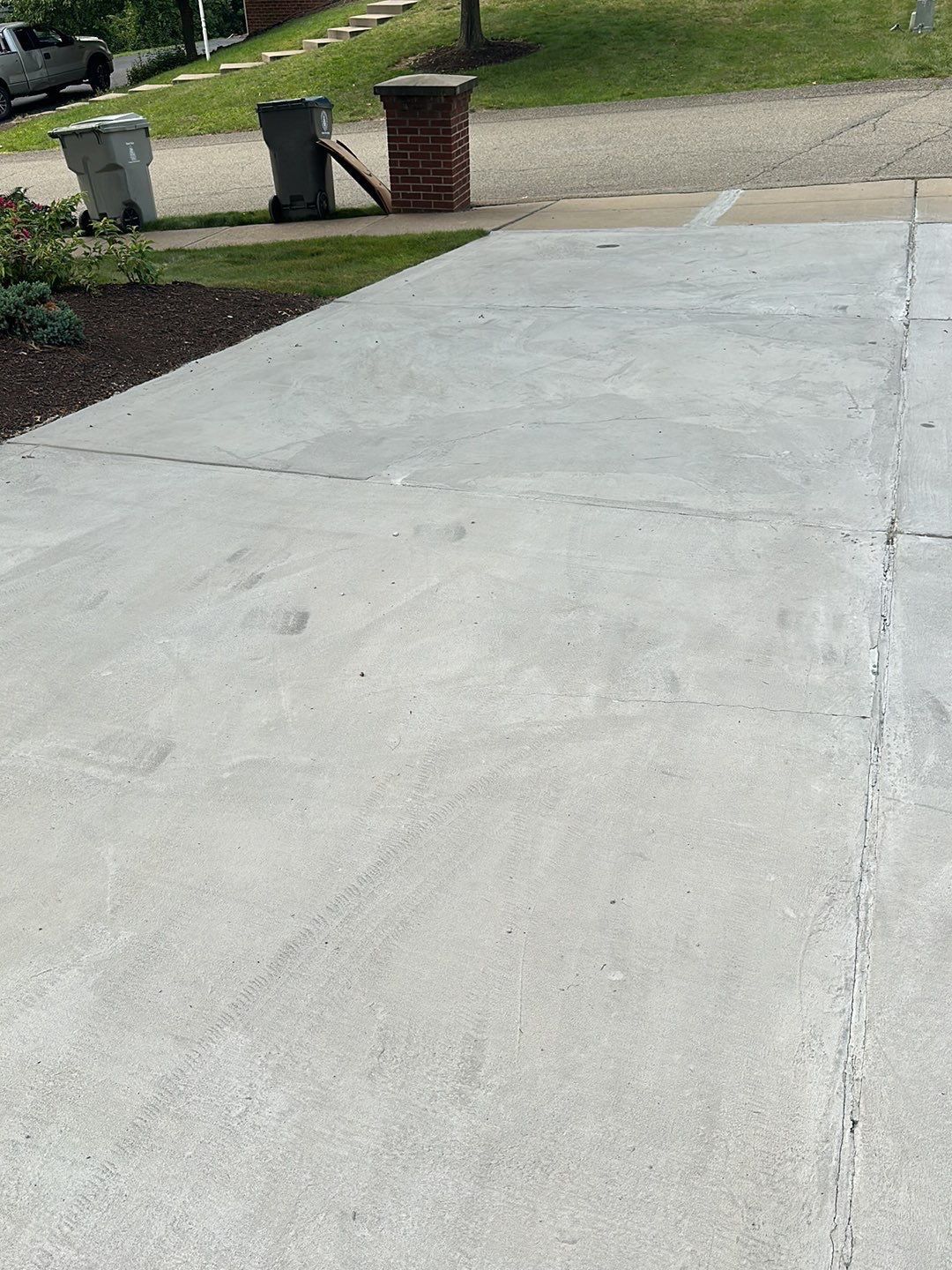 Pool Deck + Driveway + Garage Project in Venetia by Floors in a Day, Inc