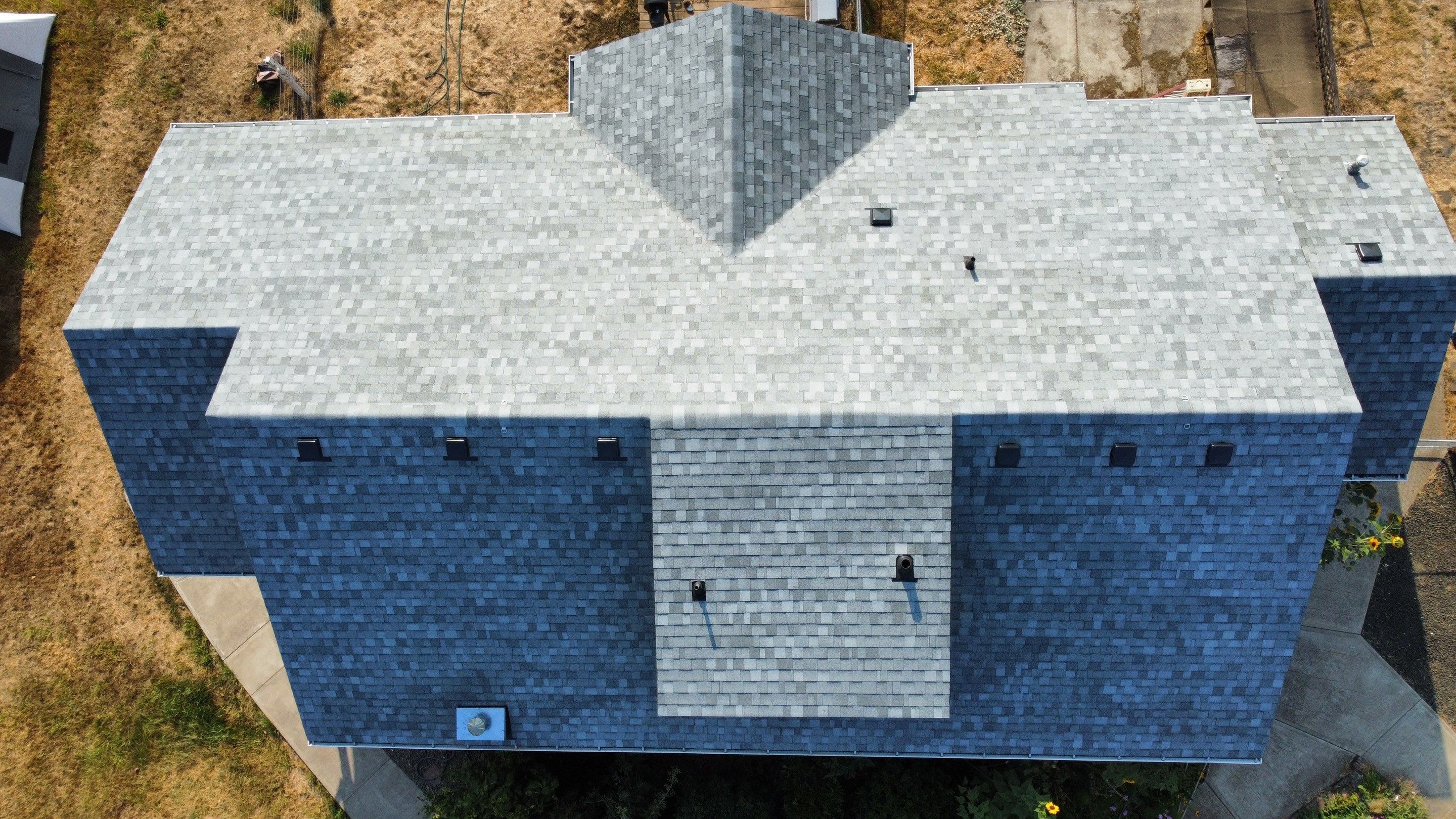 Residential Roofing Installation using IKO Dynasty (Color: Frostone Grey) by Orezona Building & Roofing Company, Inc.
