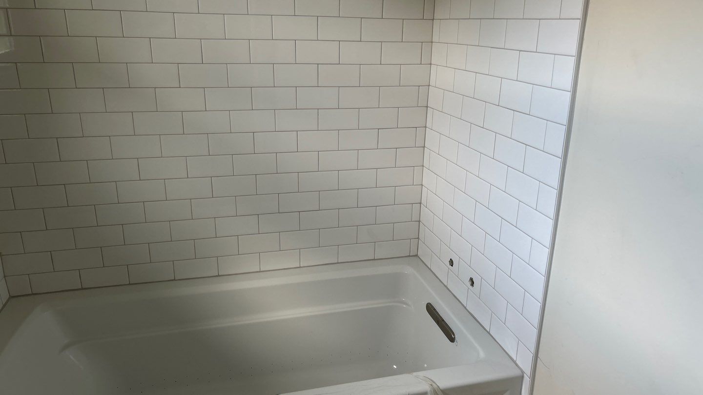 New Tub Surround  by Footprints Floors of Nashville