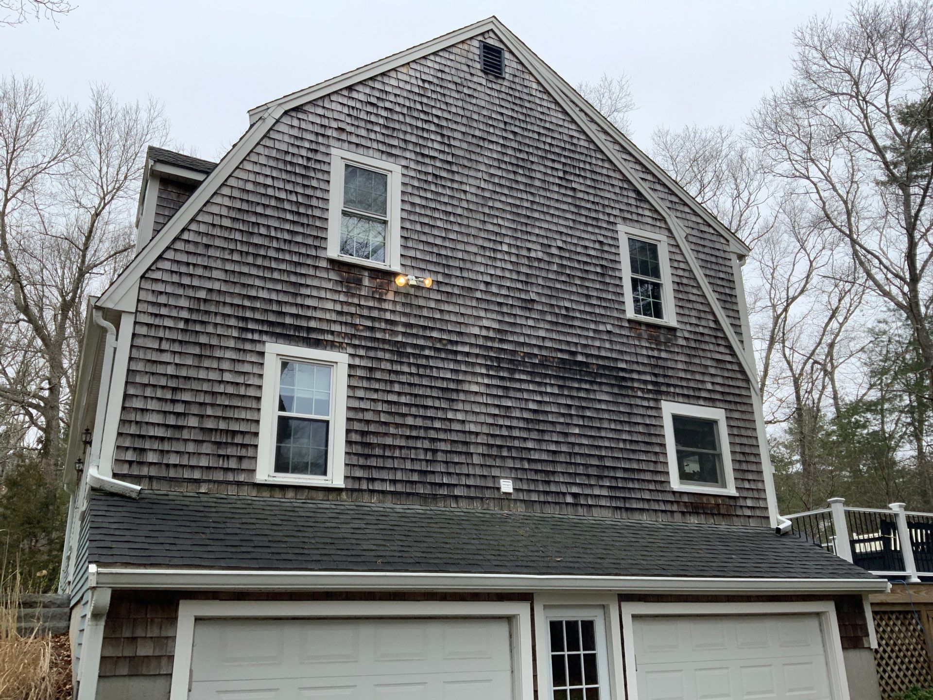 Partial residing project with Red Cedar shingles in Duxbury, MA by UBrothers Construction