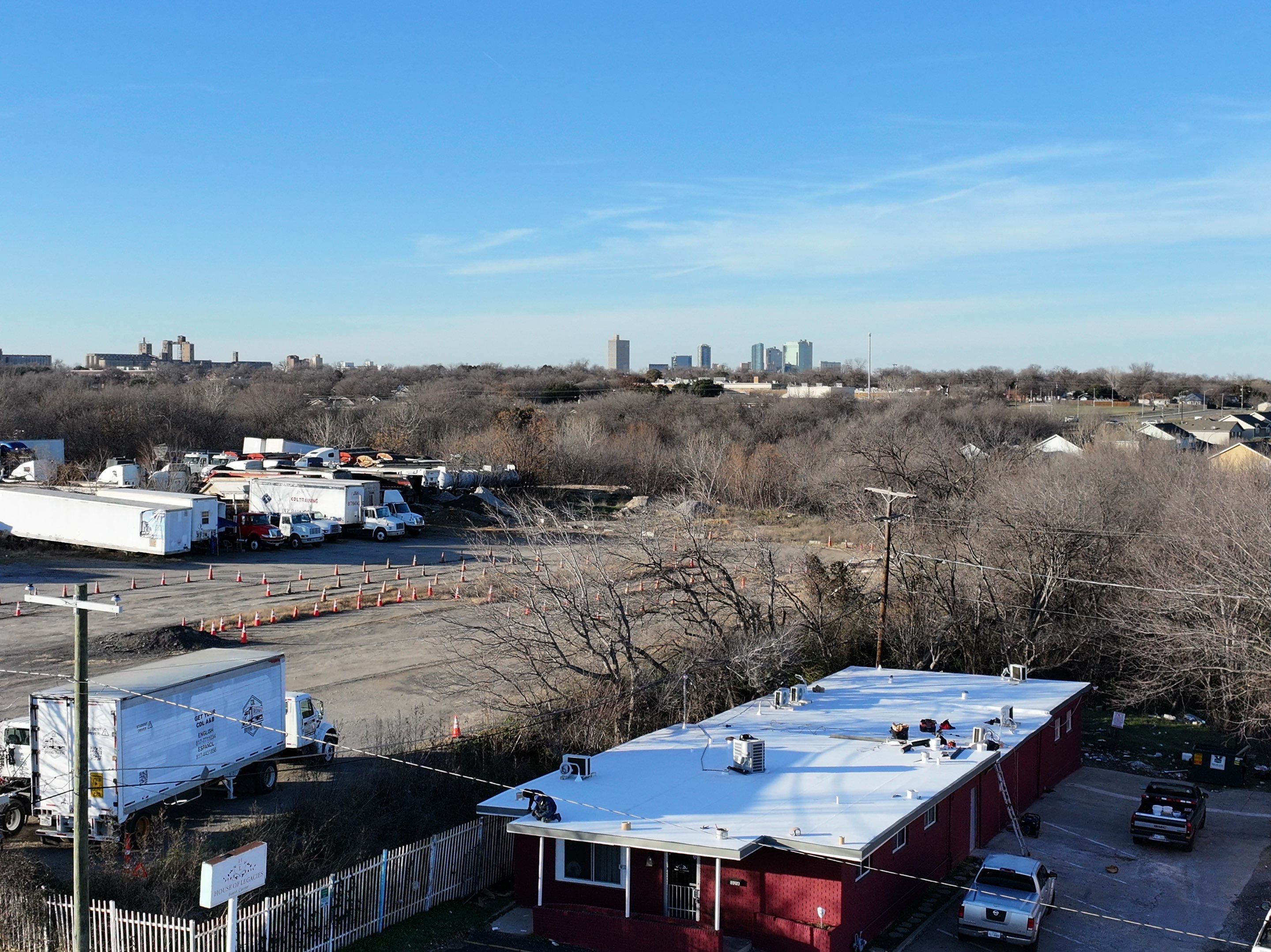 Commercial roofing overlay using GAF TPO over an old ballast roof by Becker Roofing and Exteriors