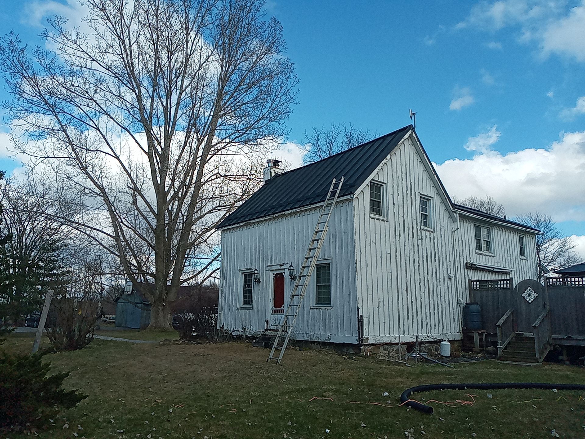 Residential Roofing Installation using 16" Standing Seam Panels by Jay Carter Roofing & Sheet Metal