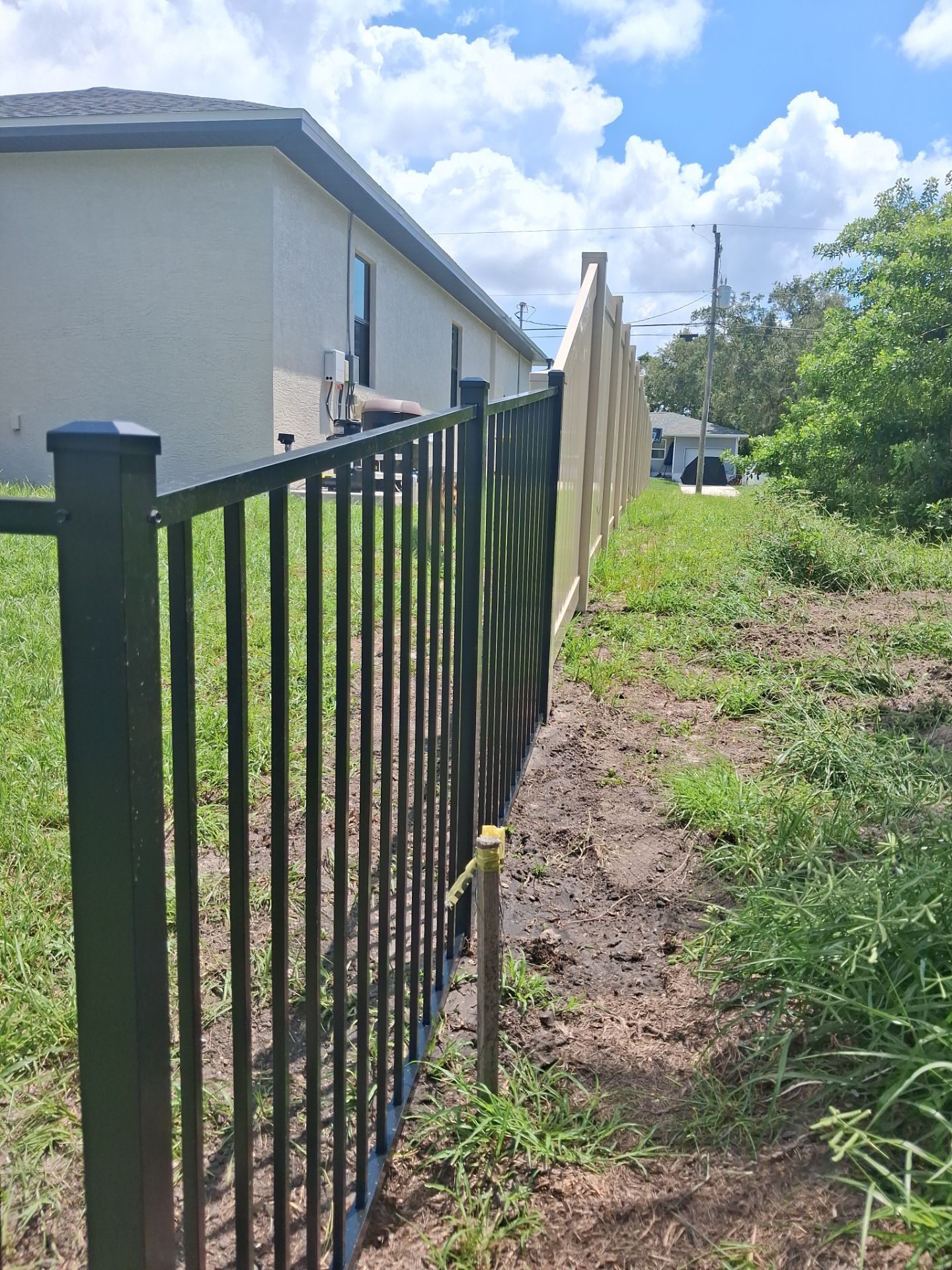 Vinyl Privacy Fencing and Aluminum Pool Security Installation in Port Charlotte by True Fence LLC