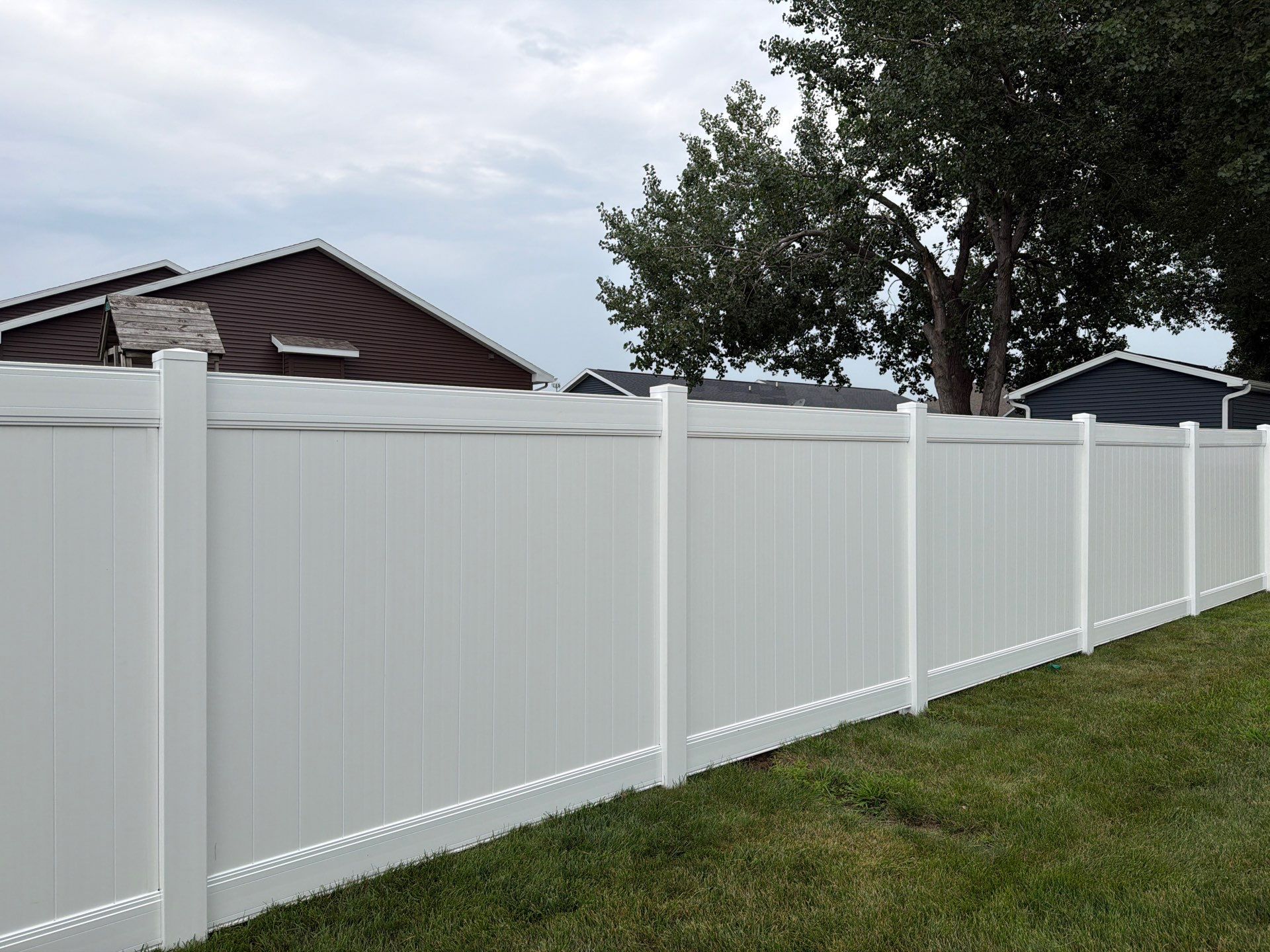 White Vinyl Privacy Fence and Double Gate Installation in Jesup by Perfect Picket Fence and Stain