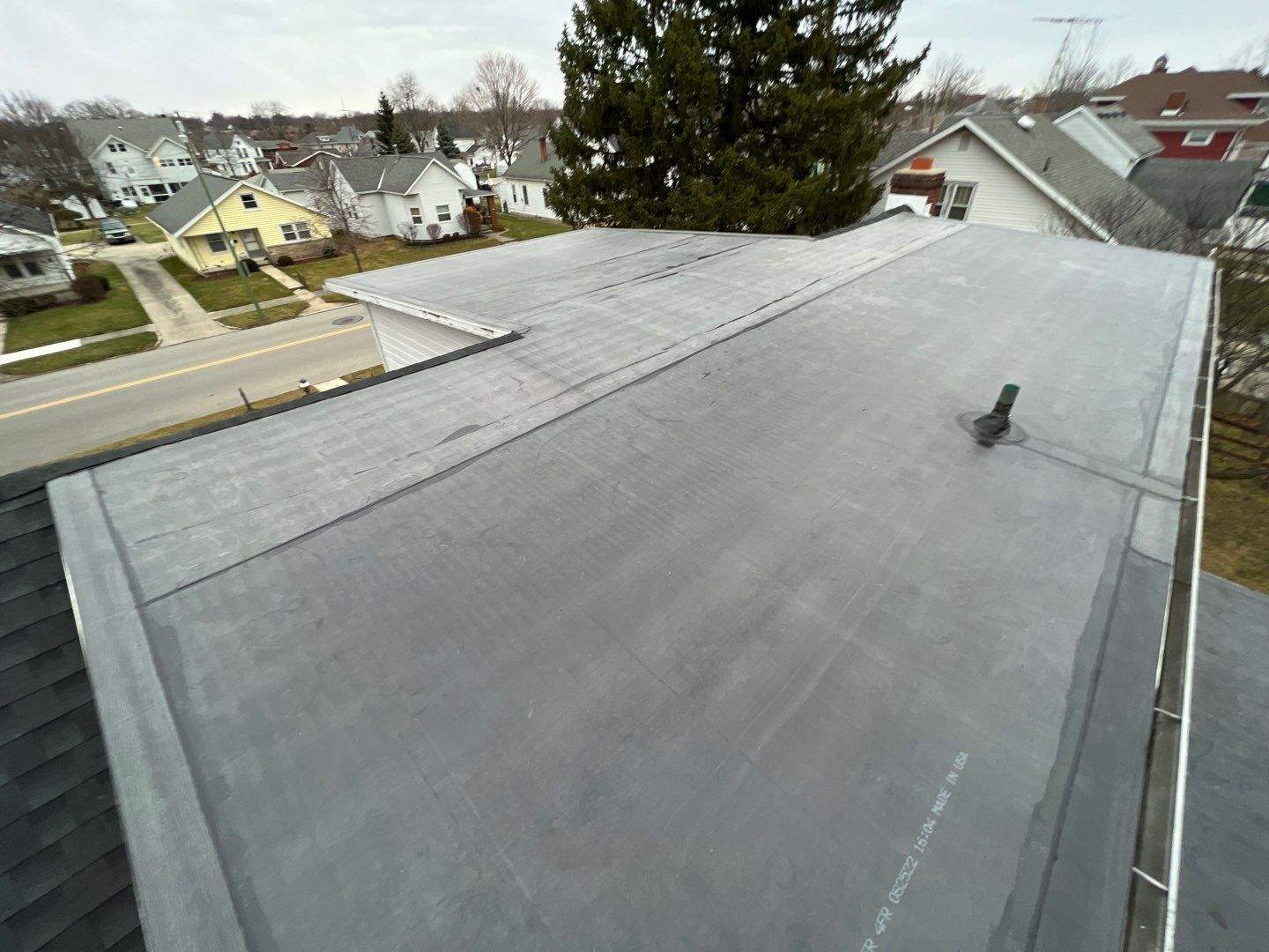 Residential Roofing Installation using 60 mil rubber roof by Nitro Roofing and Construction