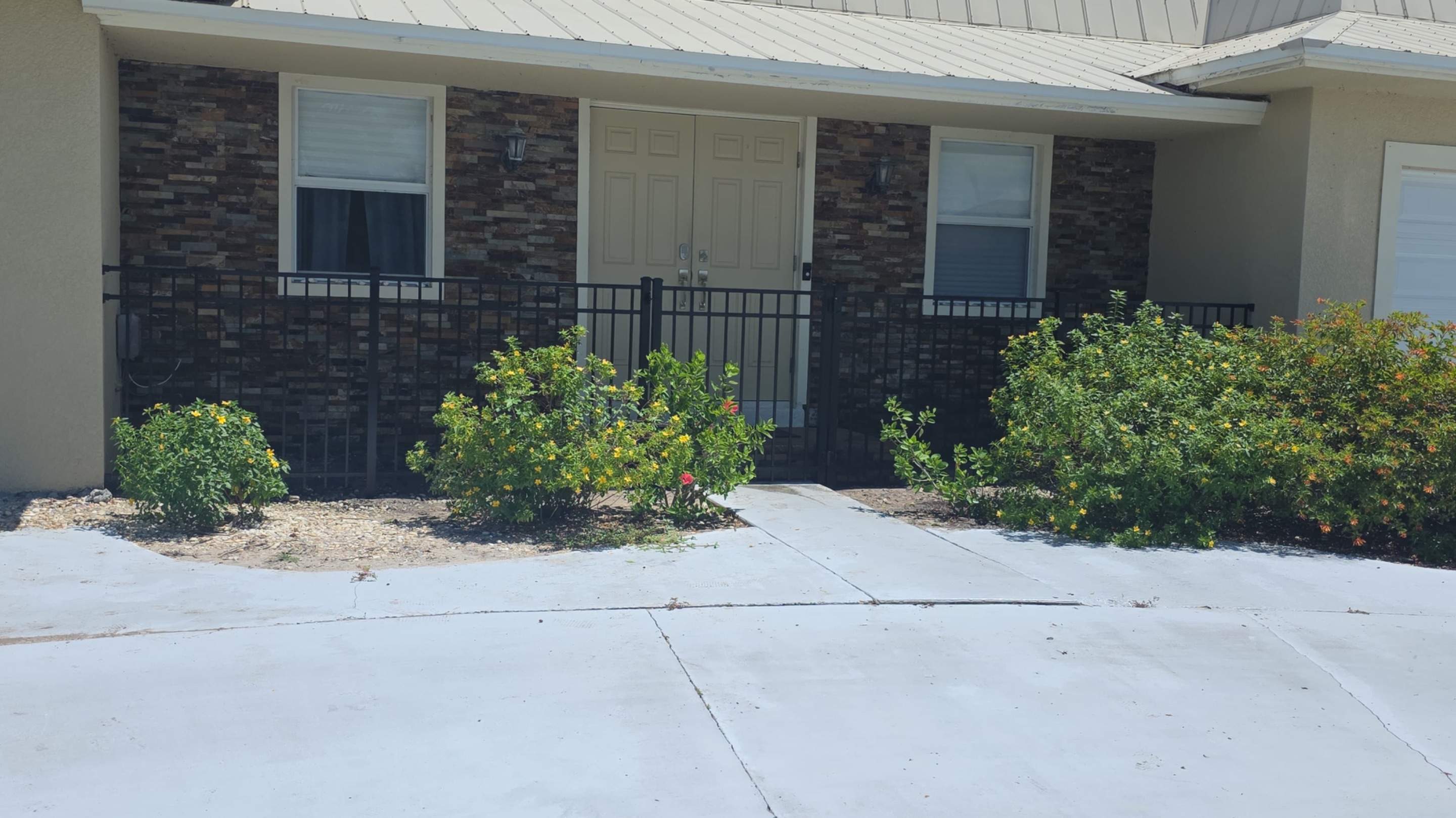Black Aluminum Picket Fence Installation in Marco Island by True Fence LLC