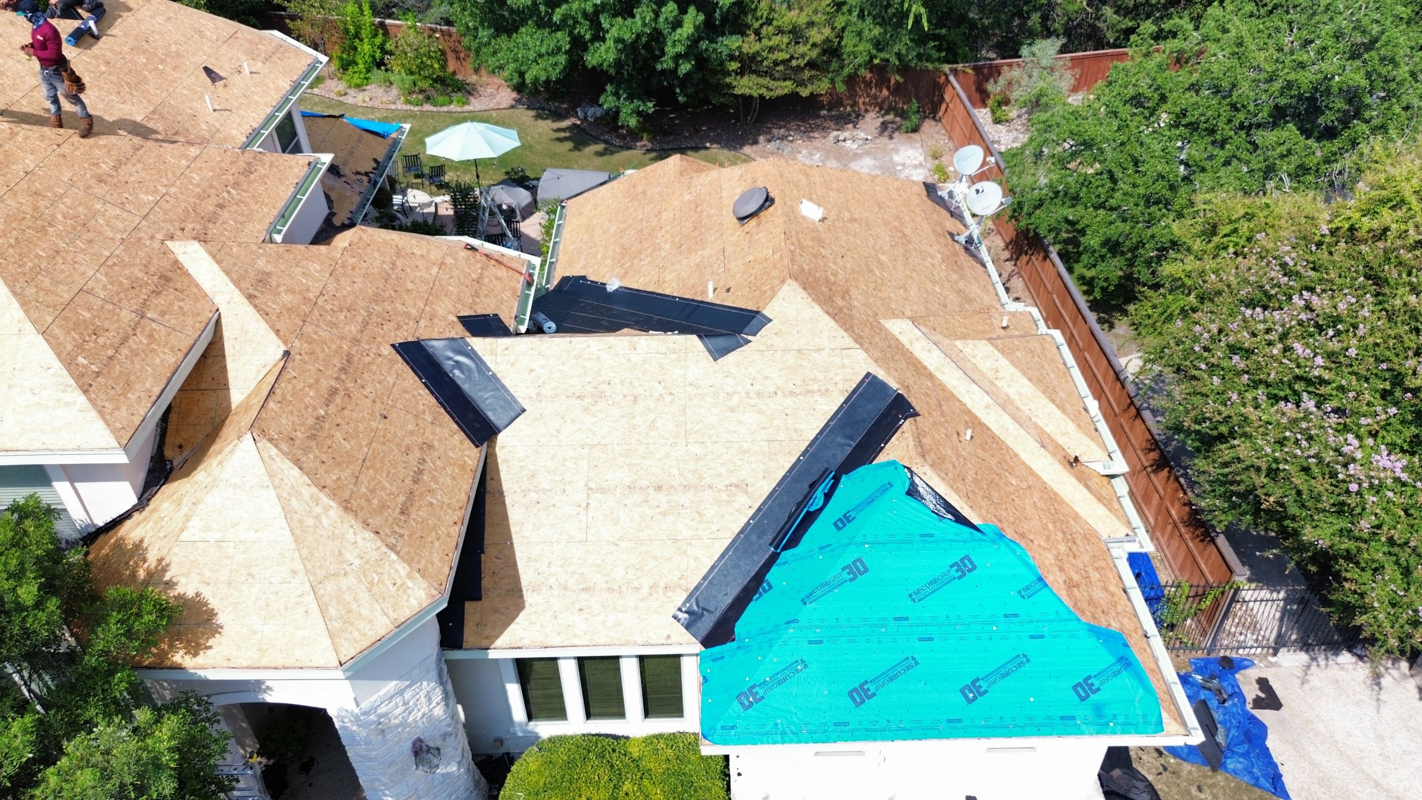 Residential Roof Replacement using 30 Year Laminate Shingles with High Profile Ridge by Premier Roofing and Contracting