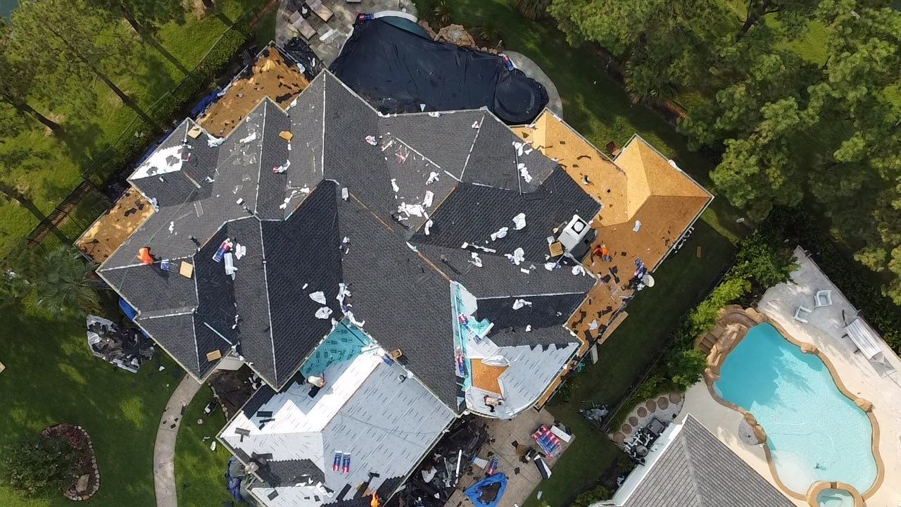 GAF HDZ Charcoal Roof Installation for Elegant Houston Home by Houston Roofing & Construction