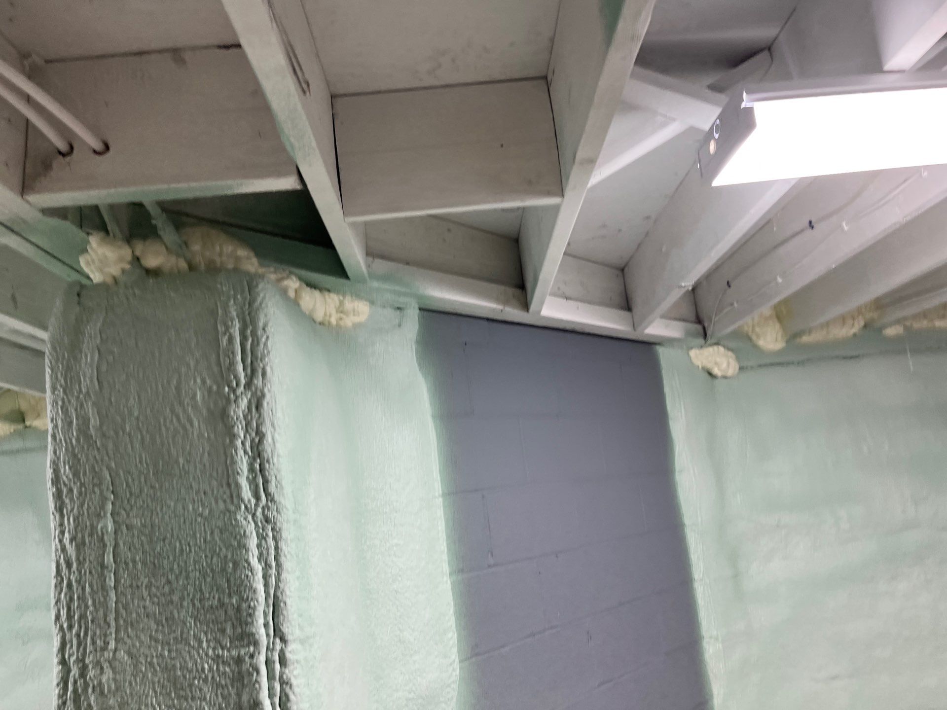 Basement Exterior Walls using Closed Cell Spray Foam by NYS Foam & Energy