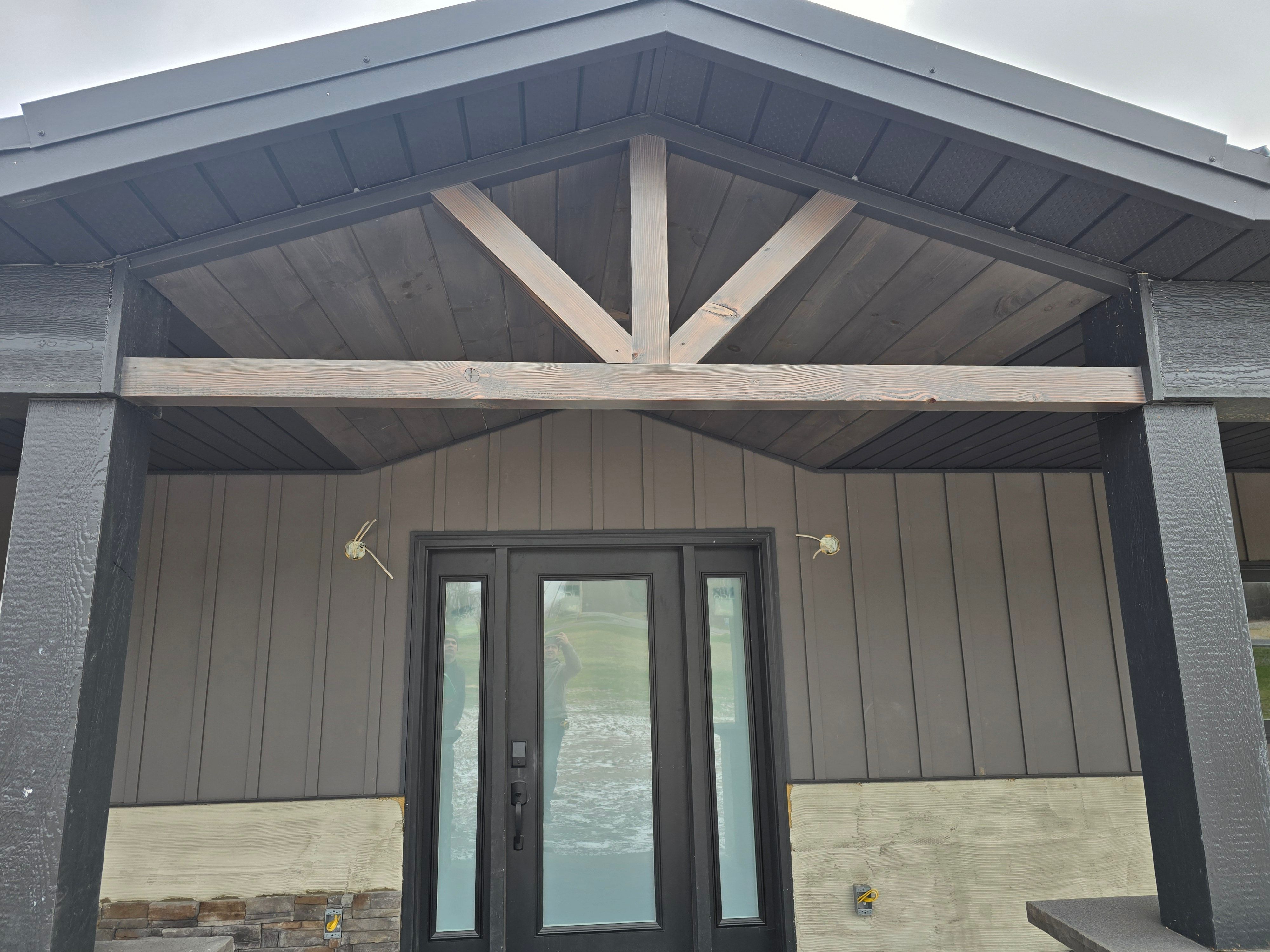 Barndominium  using Textured Board & Batton by Horst Custom Homes 