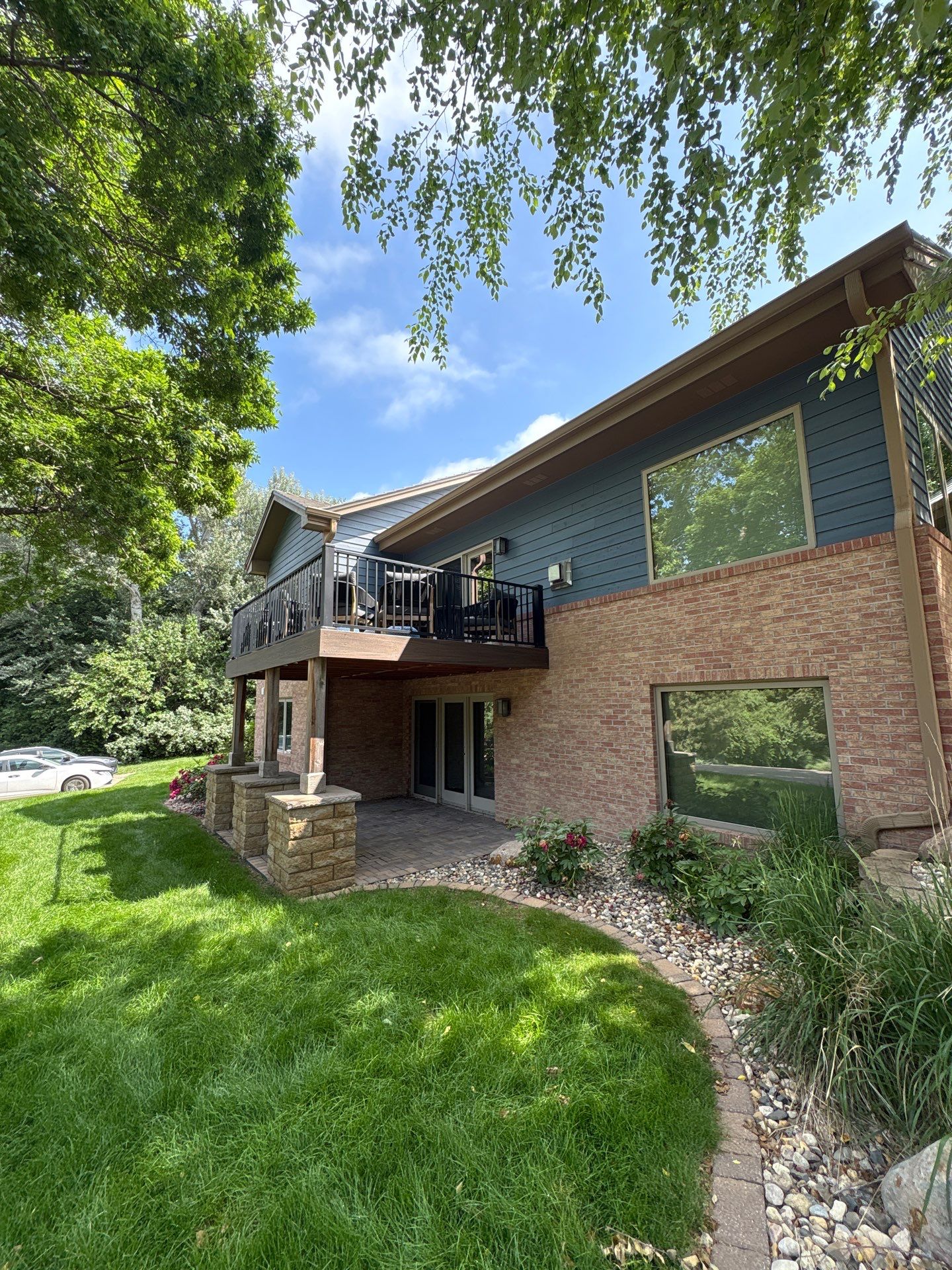 Residential Exterior Painting and Siding Refresh in Sioux Falls by Select Painting, Coatings & Garage Cabinets