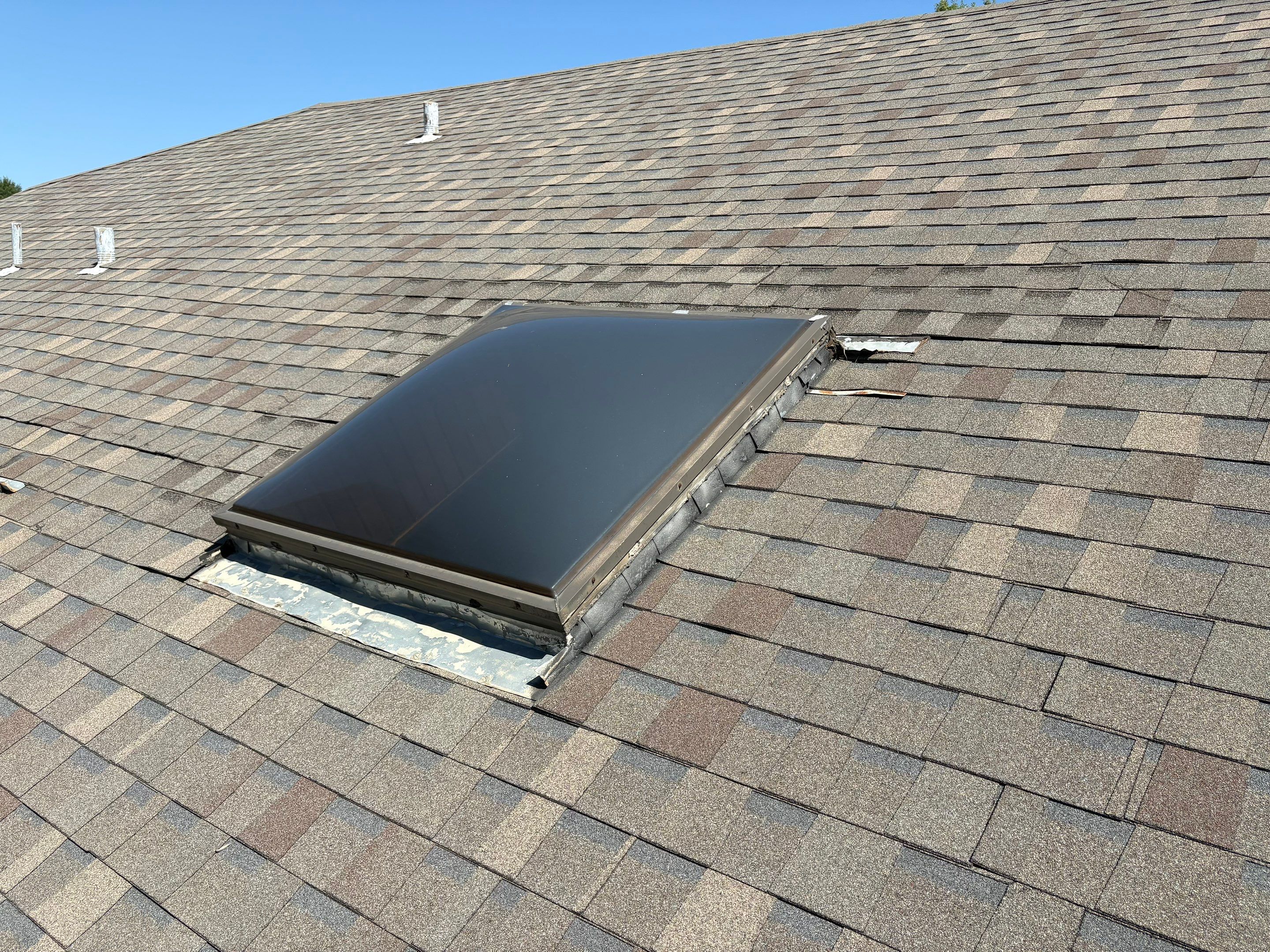 roof repair & skylight flashing repair in Yukon by McCann's Roofing and Construction