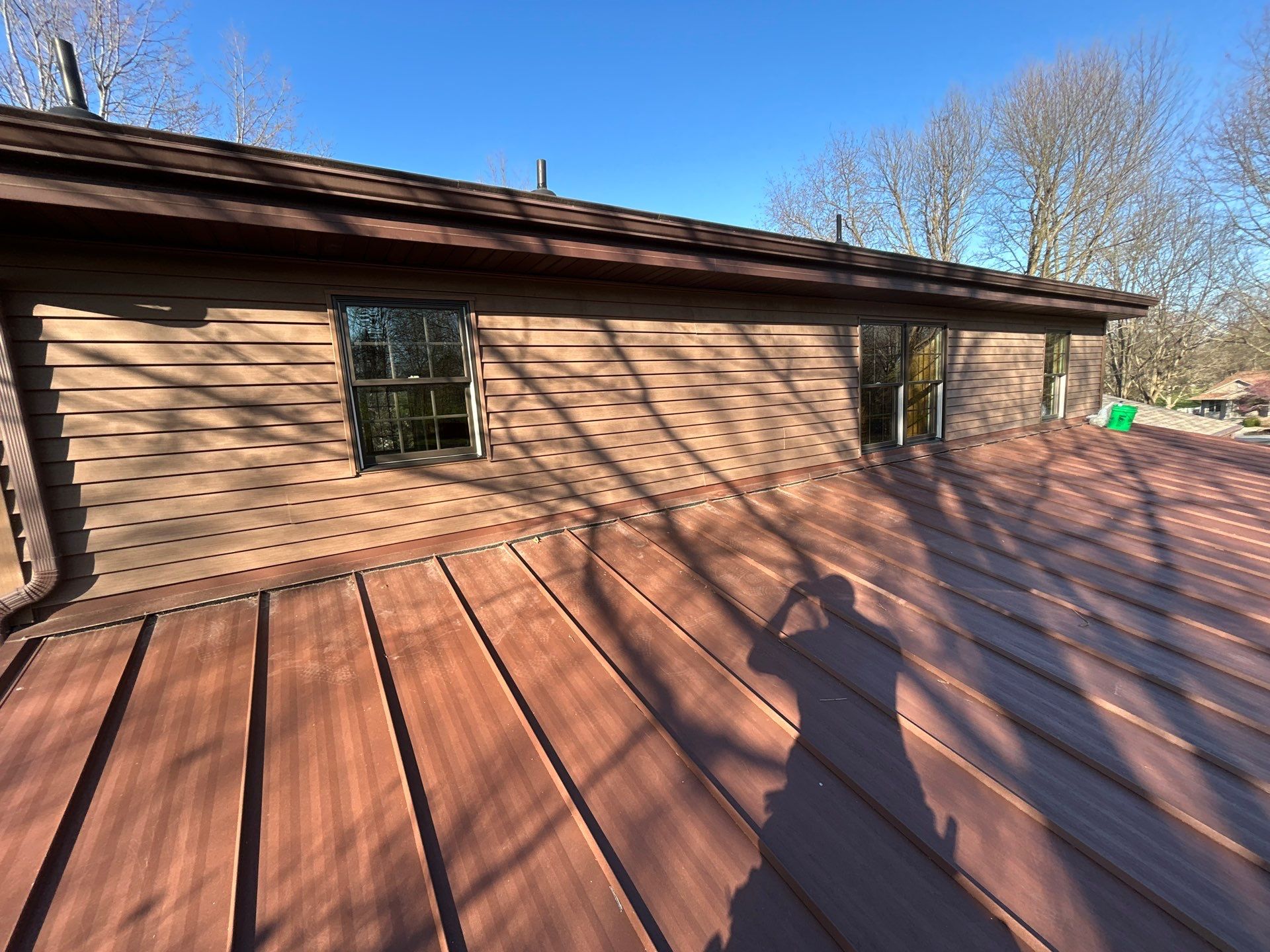 Pella Window installation using Pella Lifestyle wood/Aluminum window by United Windows and Siding LLC