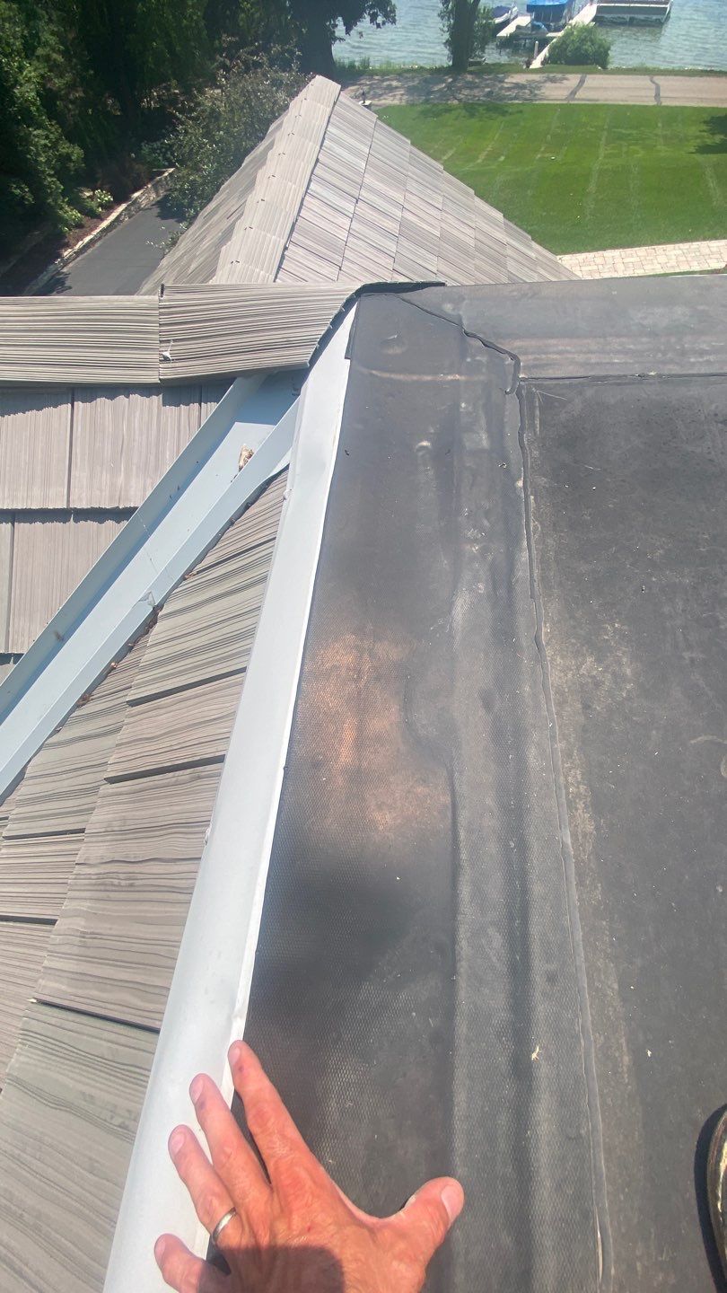 DaVinci Roof Installation with Snow Guards in Oconomowoc Lake by Custom Installations