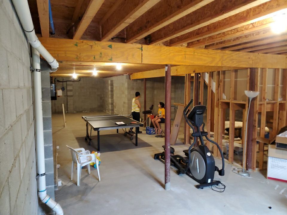 Garage Floor using Penntek Slatestone by Spectrum Painting, LLC