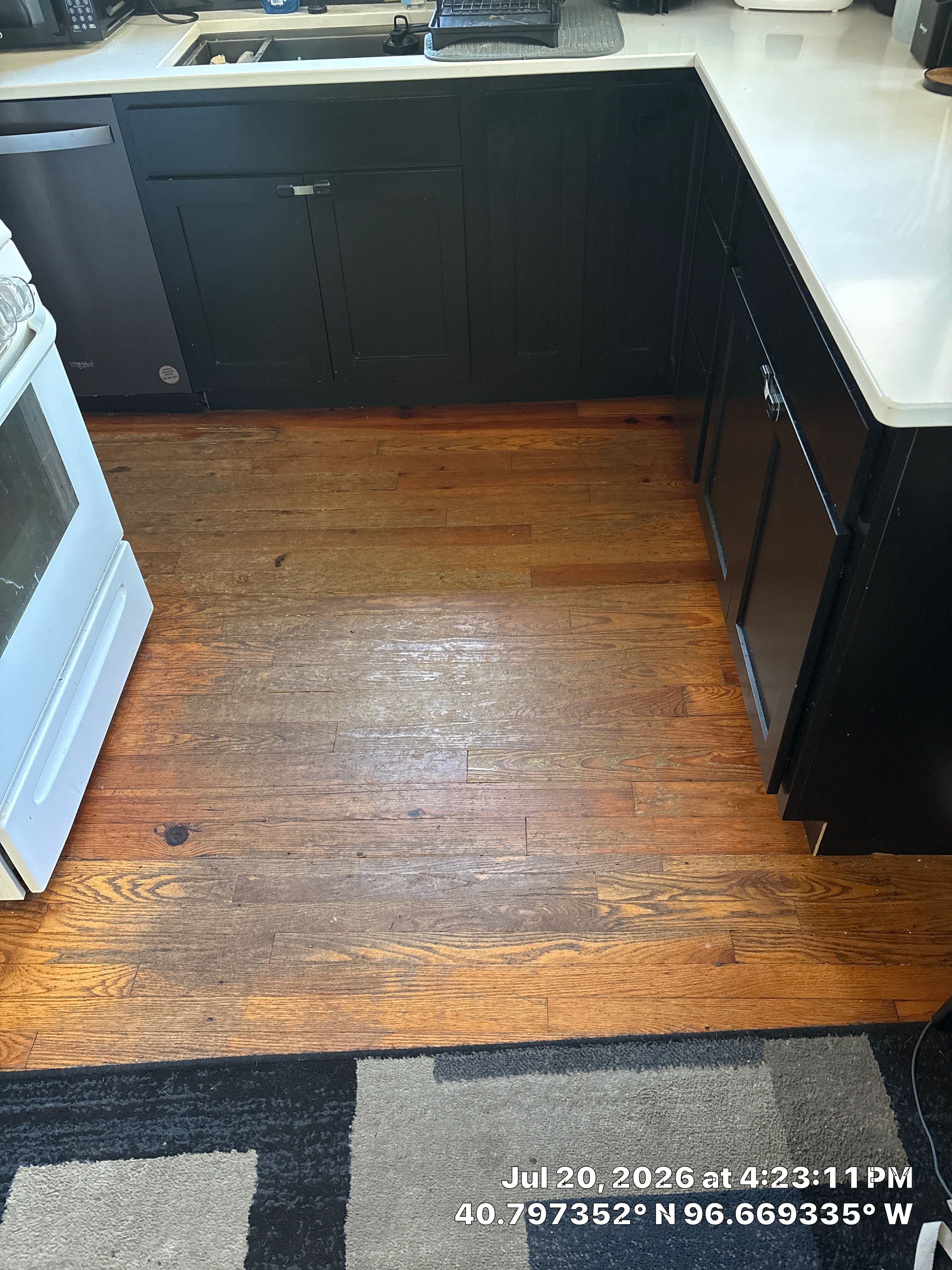 Kitchen Remodel in Lincoln Nebraska Featuring Two-Tone Cabinetry and Black Backsplash by CompanyCam Sales Demo