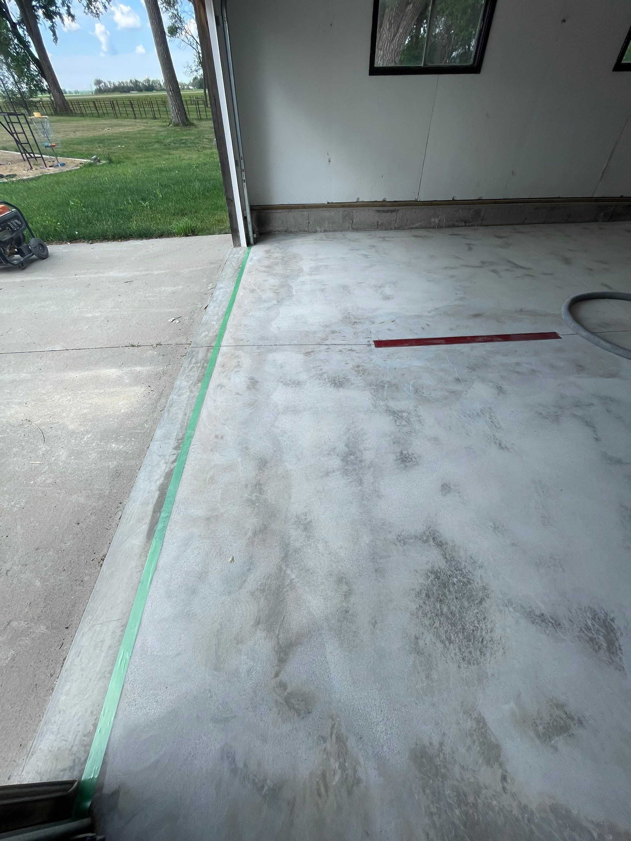 Hartford Residential Garage Floor Transformation With Decorative Chip Coating by Select Painting, Coatings & Garage Cabinets