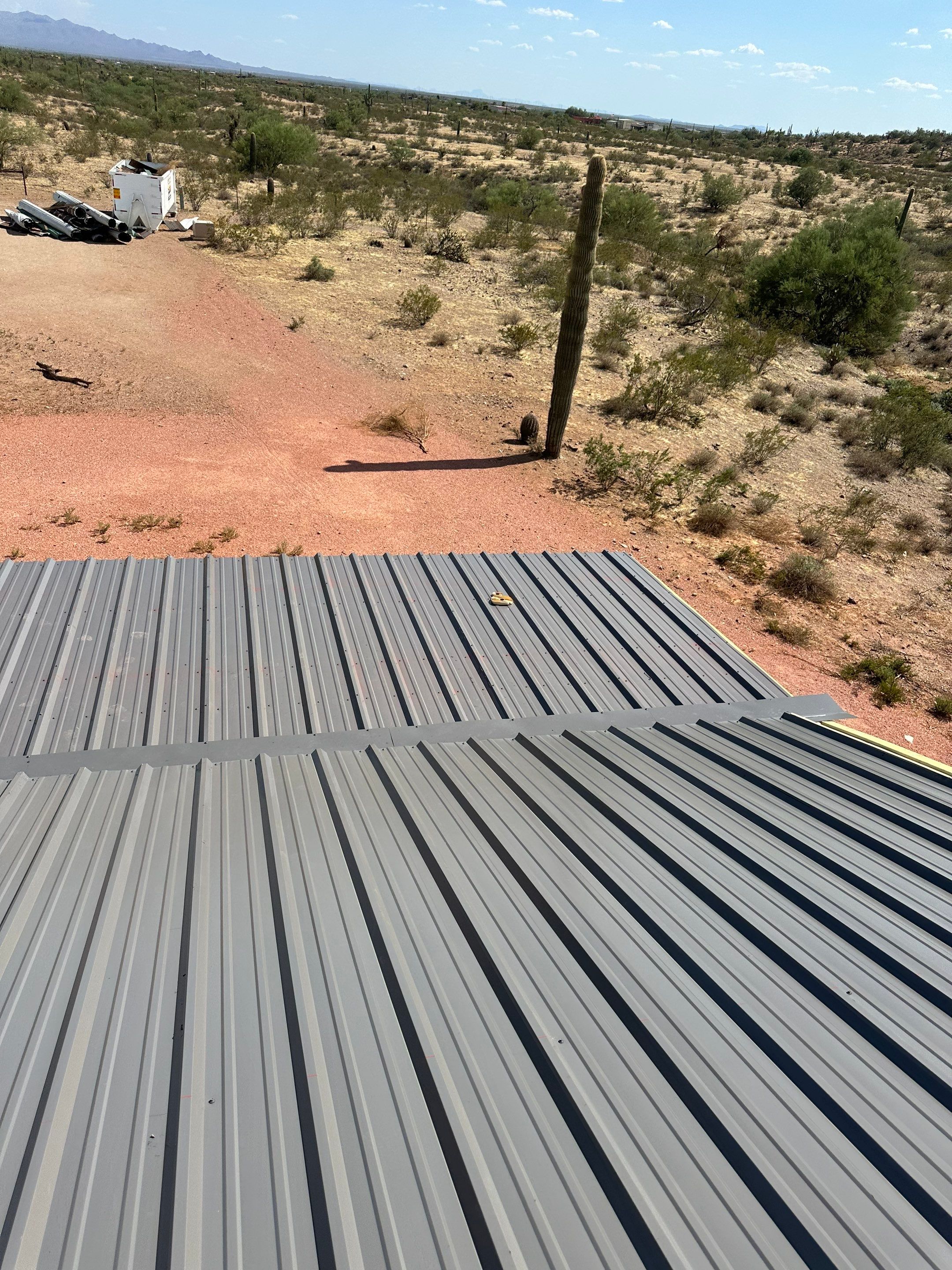 Slate Gray Exposed Fastener by Reimagine Roofing