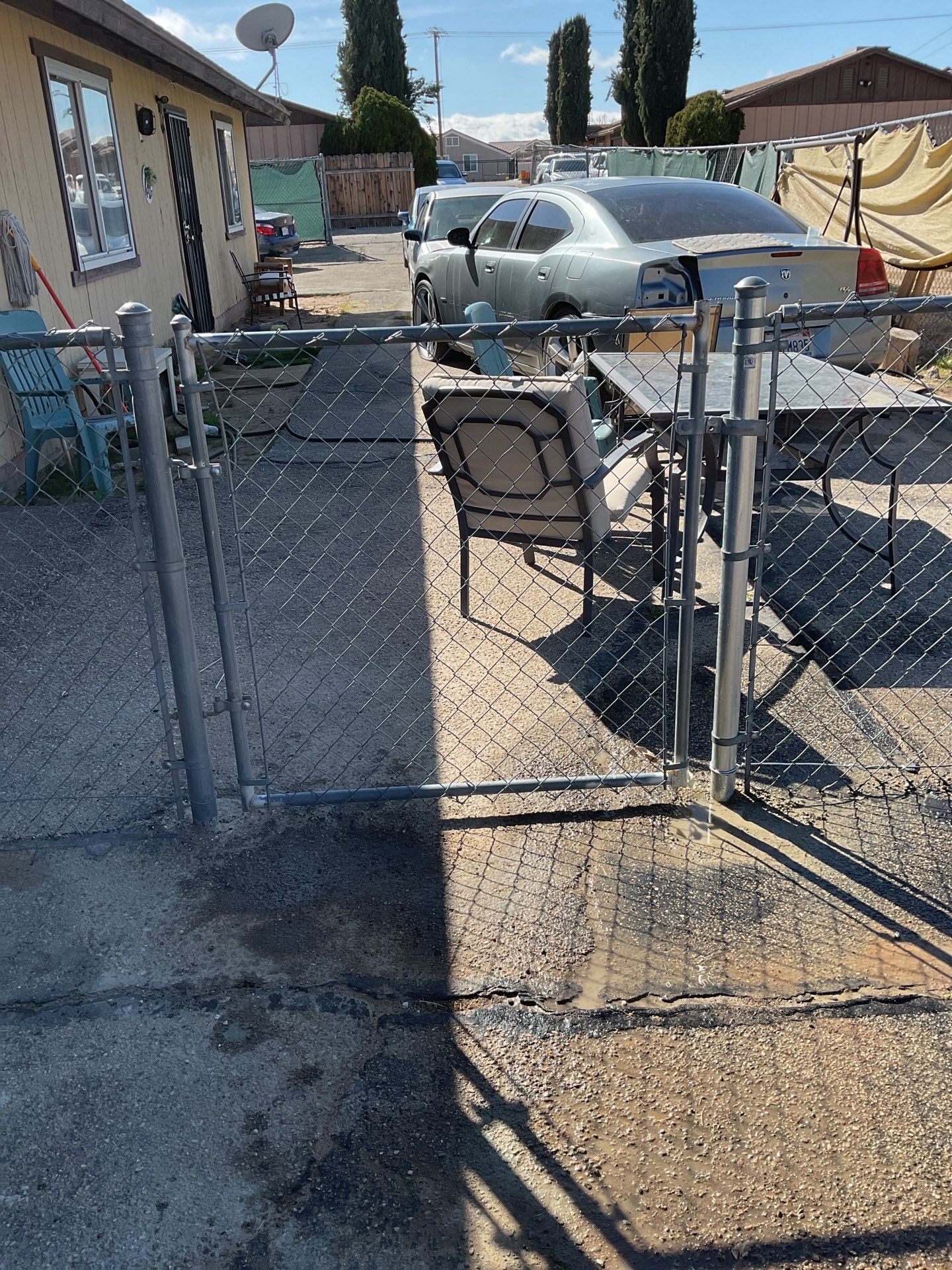 Gate Repair using chain -link by Fence Guys Inc. 