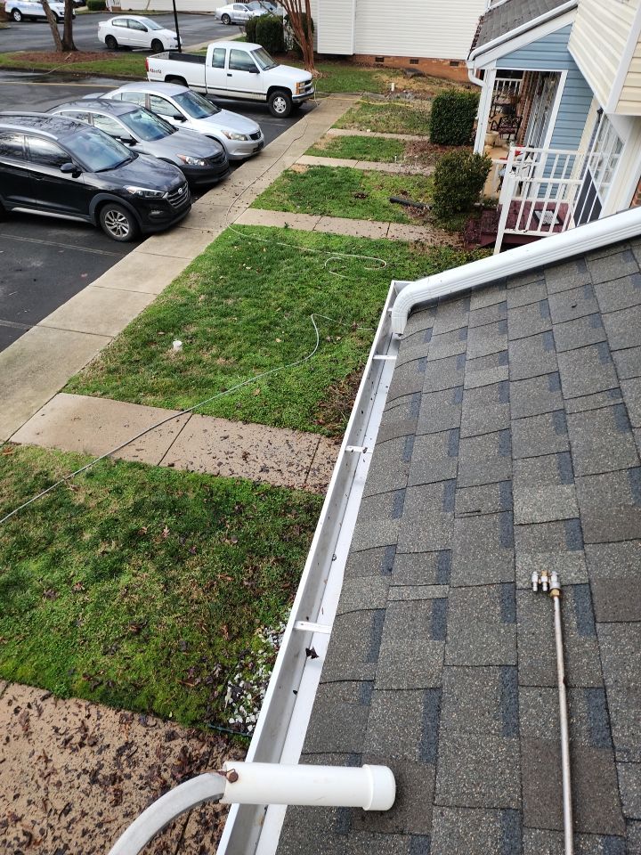 Gutter Cleaning using water by Power Wash Masters LLC