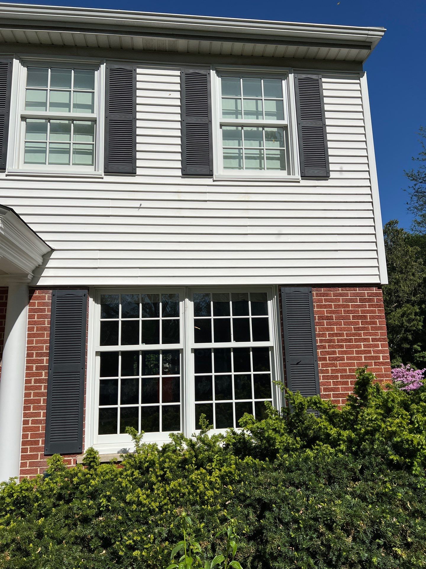 Housewashing  using Algaecide, soft wash soap by Northern Power Washing LLC.