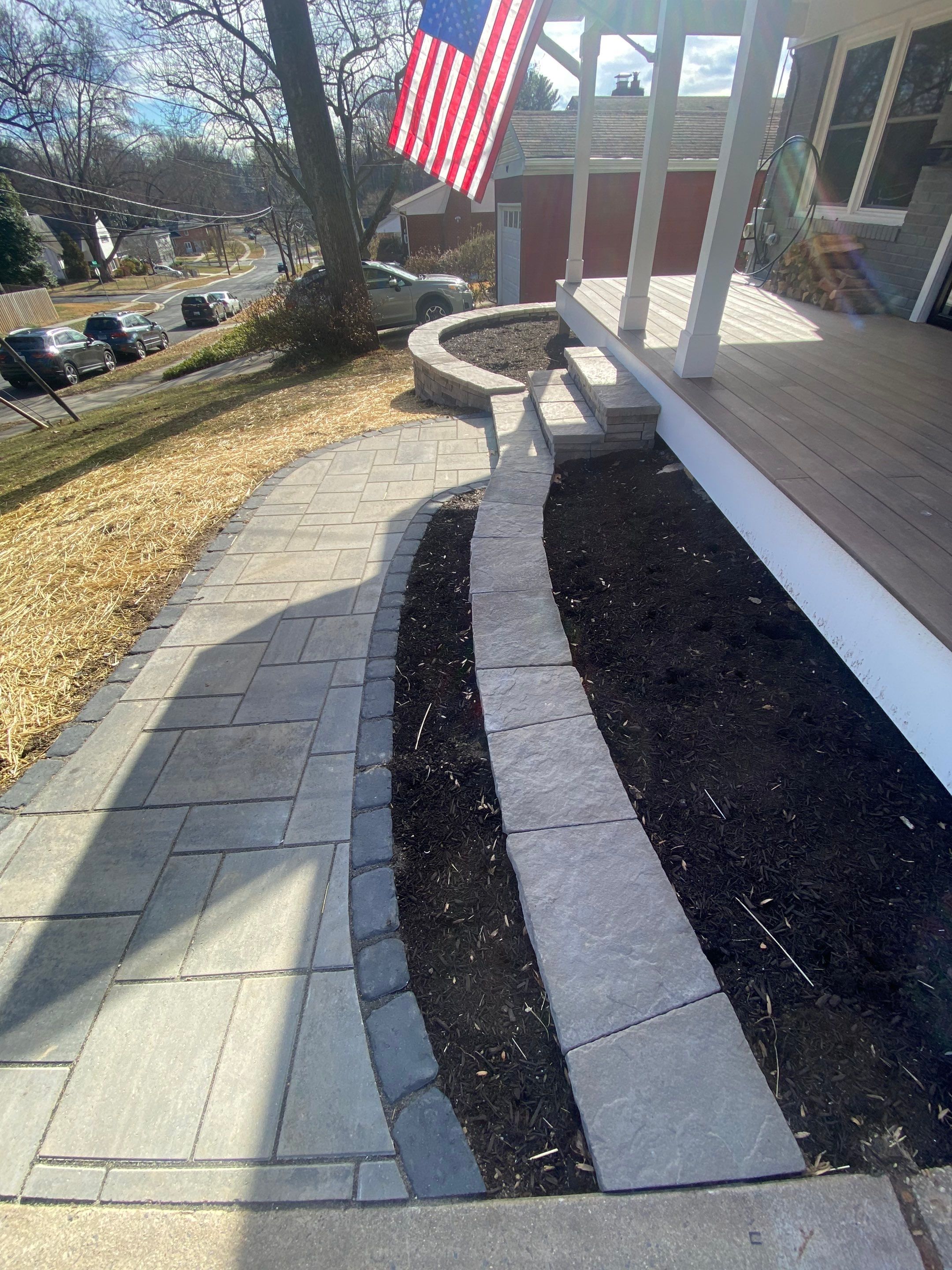 Retaining wall, walkway, small patio and landscape install by The Smet Companies, LLC