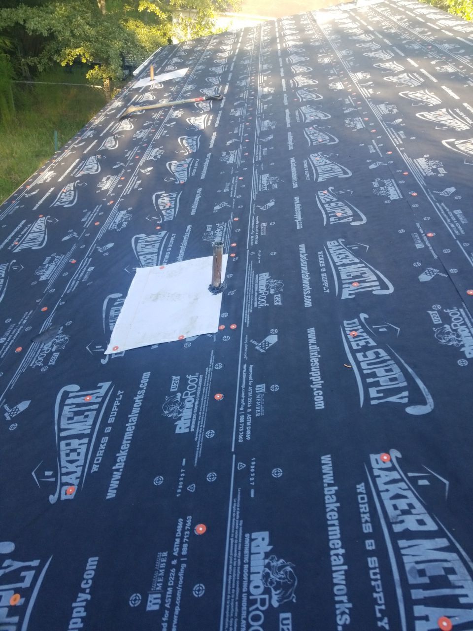 Residential Roofing Installation using Metal roofing by American Roofing & Construction LLC