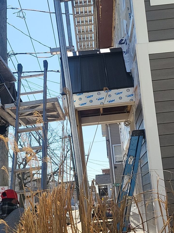 Siding Installation using Hardie Plank Aged Pewter by A Plus Exterior