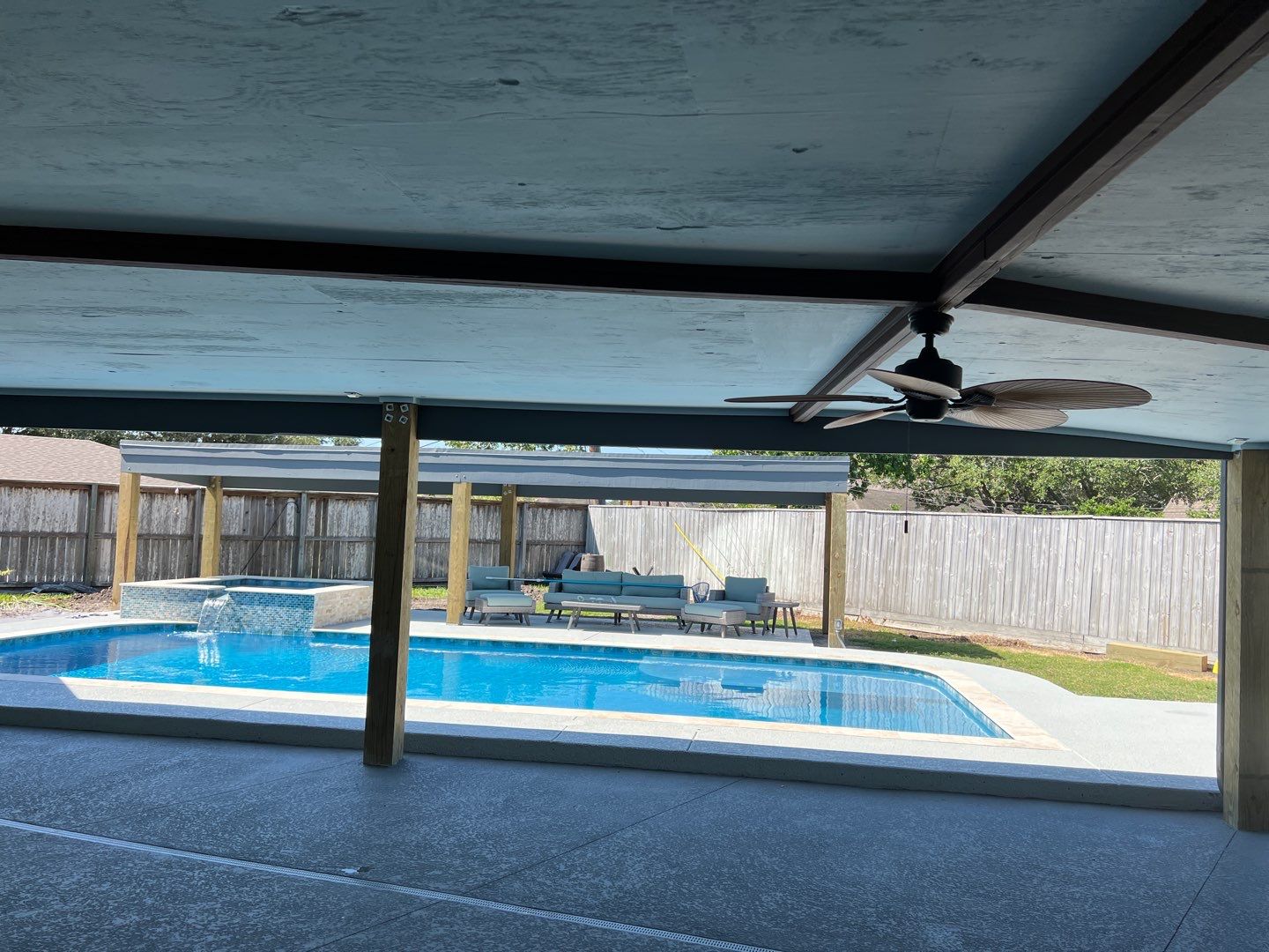 Beautiful pool side build by Bayfront Roofing and Construction