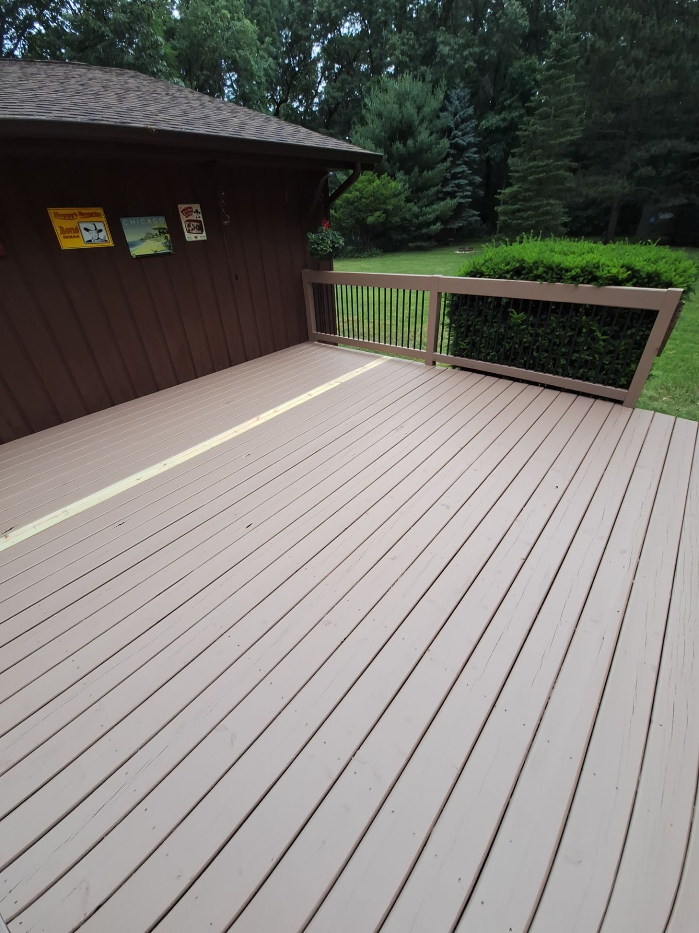 Muskegon Deck Restoration with Pressure Treated Railings and Wood Staining by Gordon Painting