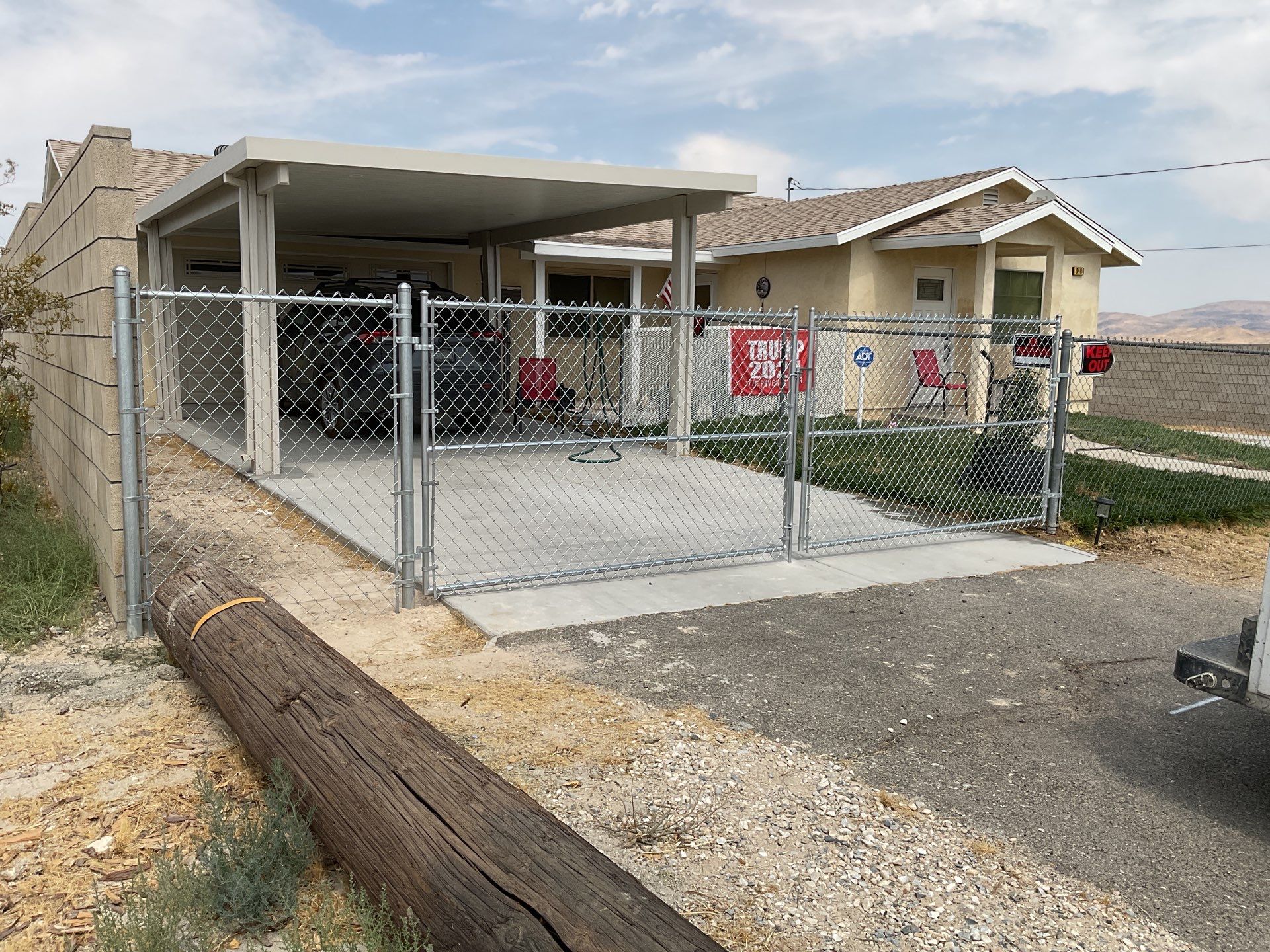 Gate installation using chain link by Fence Guys Inc. 