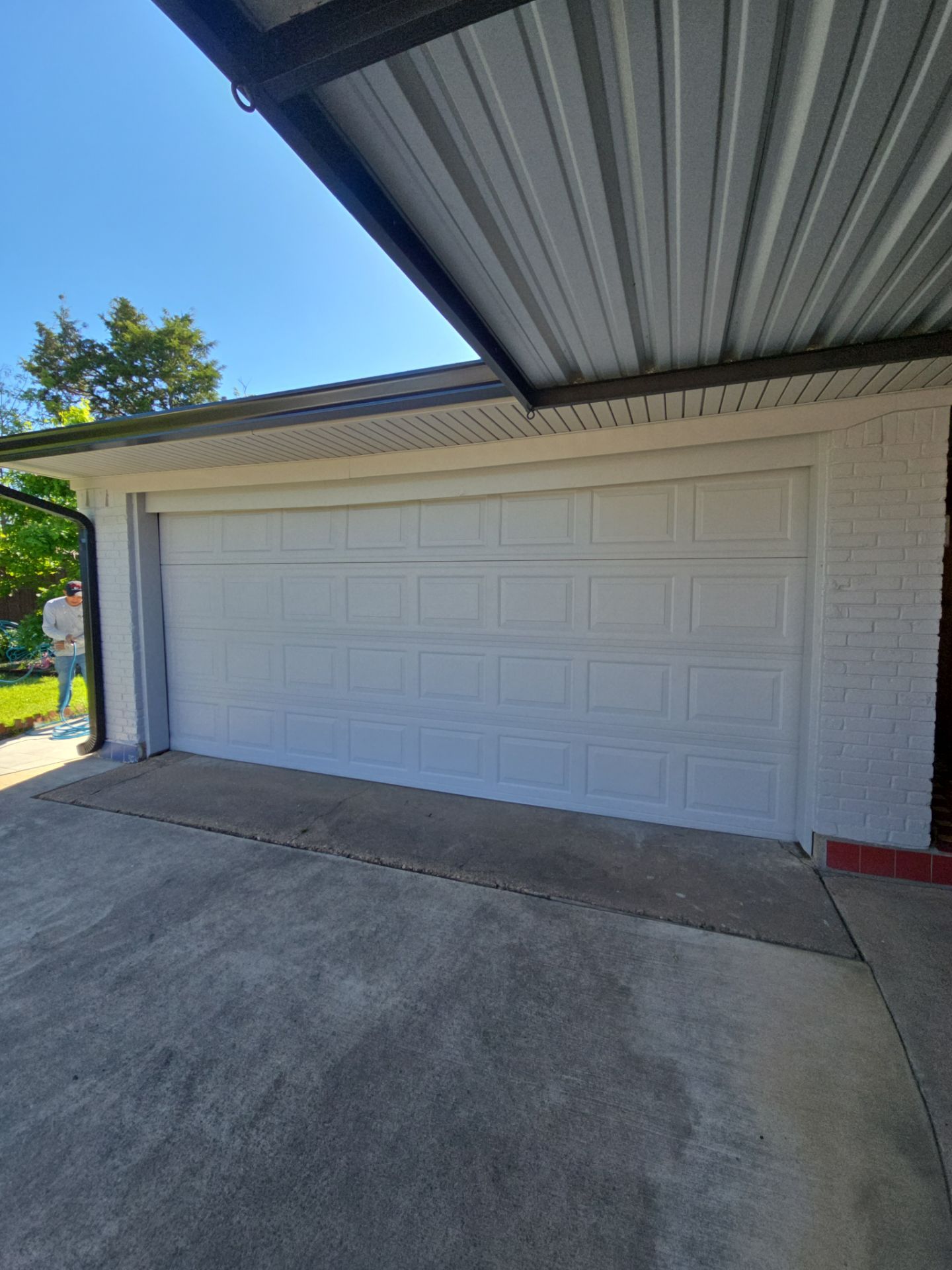 Exterior Home Paint Project with Different Surfaces by SLM General Contractors & Roofing