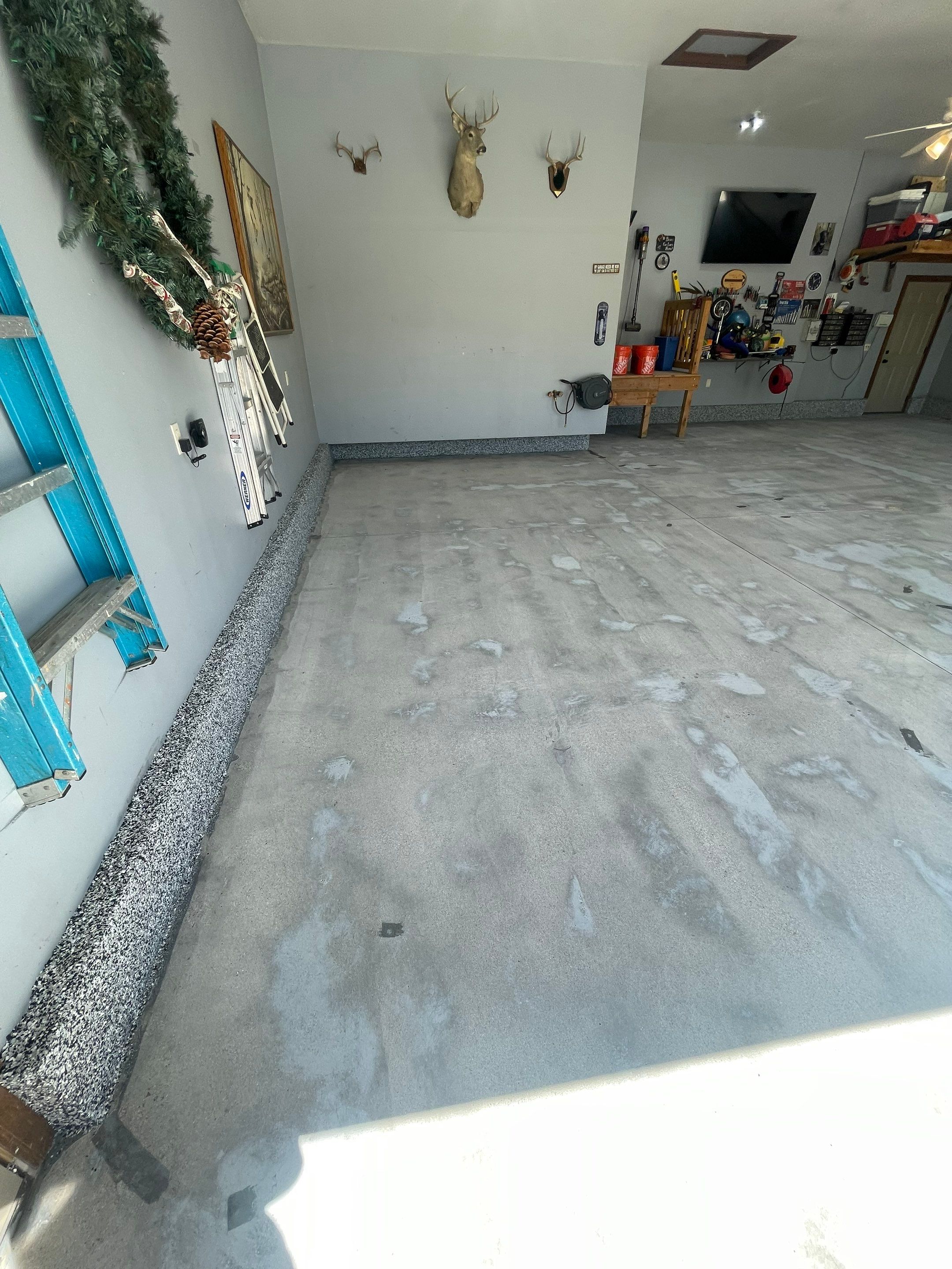 Residential Garage Floor Coating in Sioux Falls by Select Painting, Coatings & Garage Cabinets