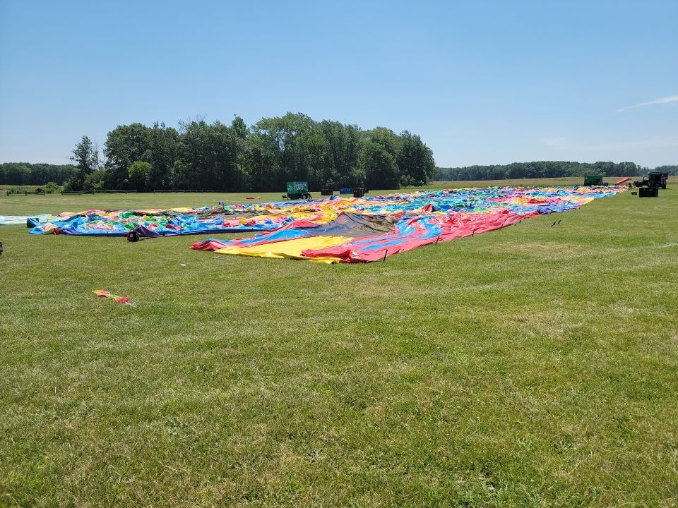 Cleaning for big bounce america prior to a large event by Northern Power Washing LLC.