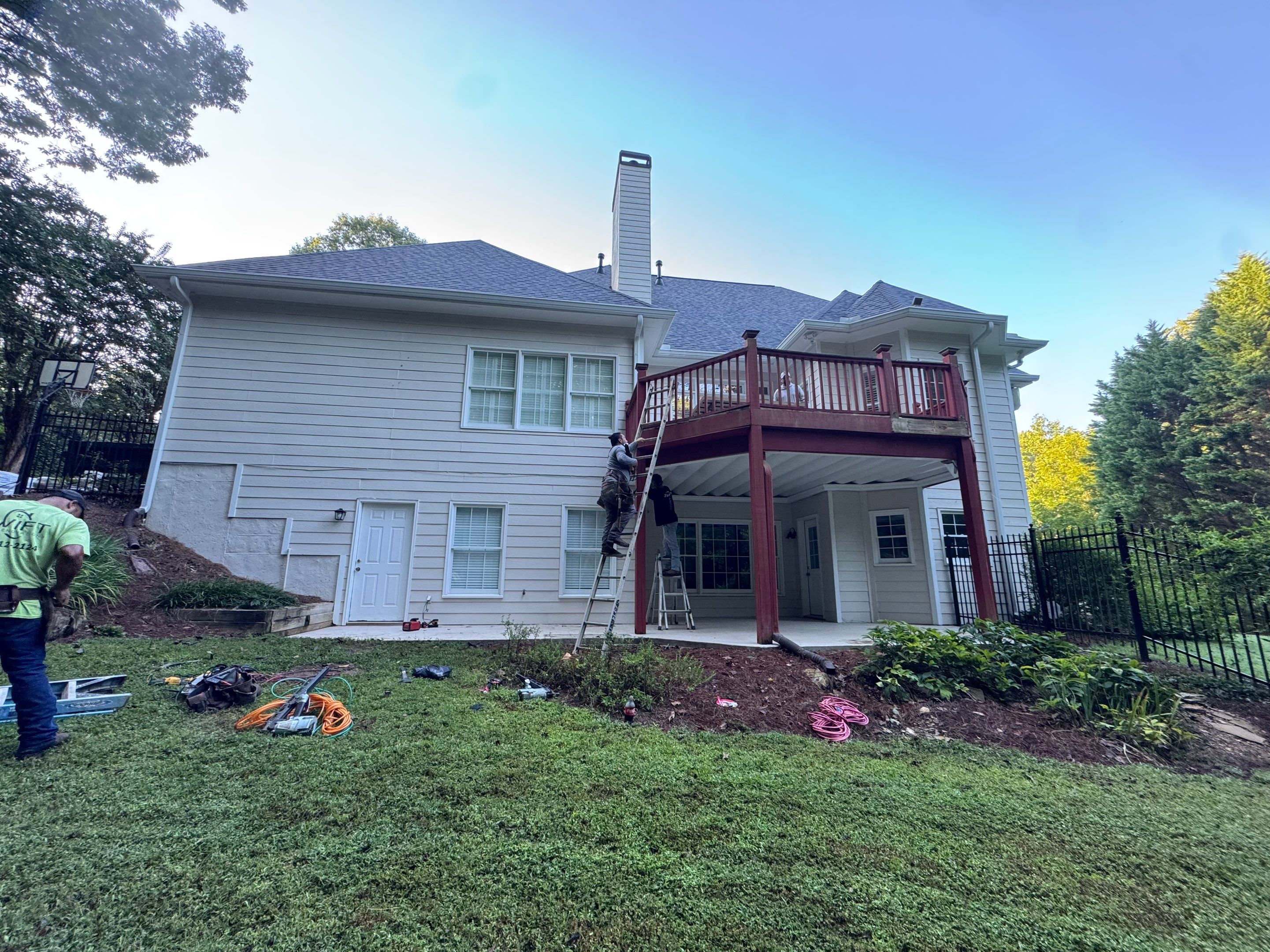 Elevated Composite Deck Replacement with Metal Railings in Smyrna by Swift Home Renovations 