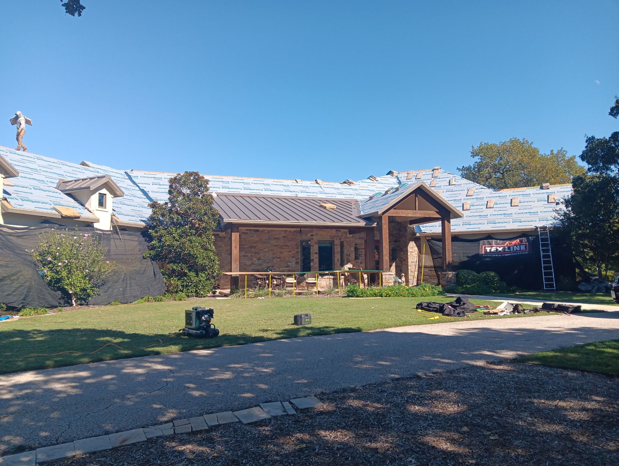 Insurance Claim Roof and Gutters using Certainteed Landmark Weathered Wood by Tex-Line Roofing
