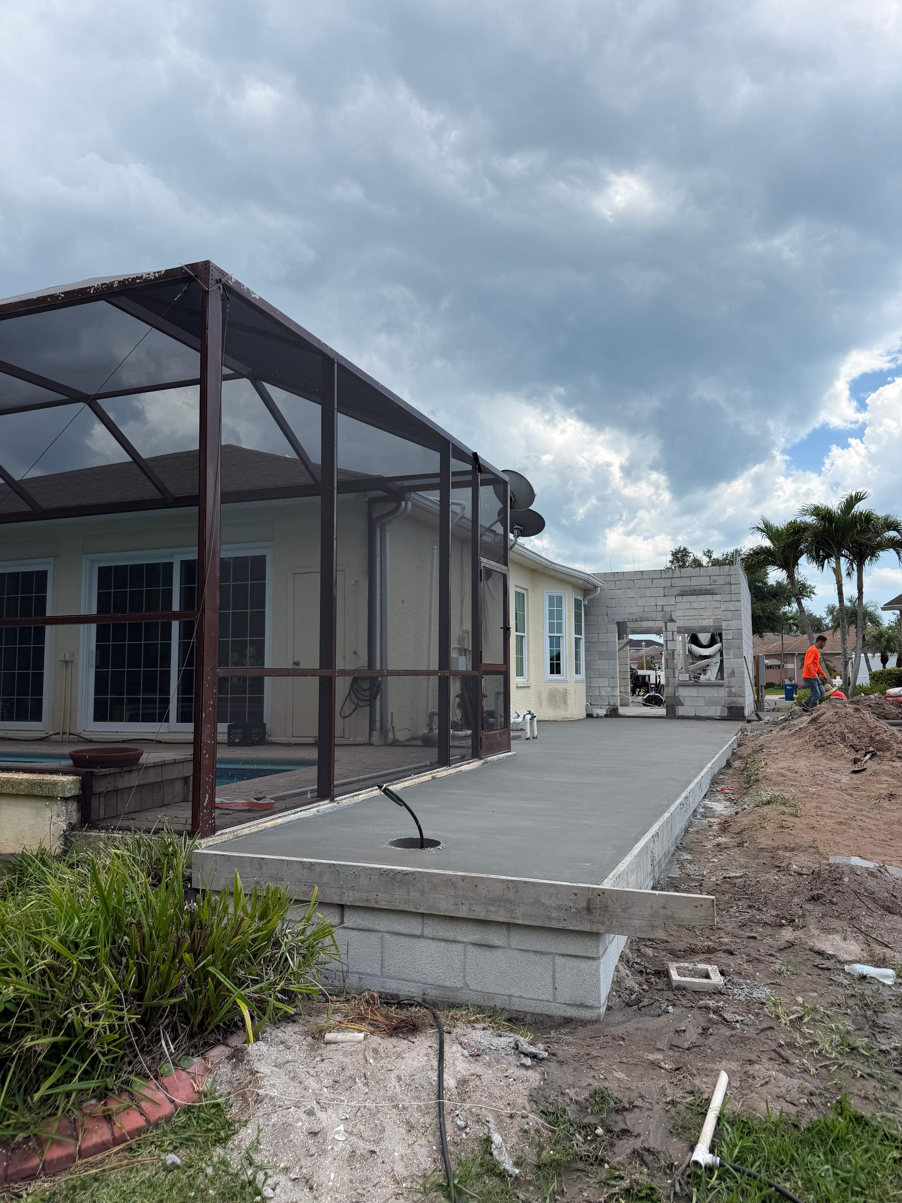 Custom Single-Car Garage Addition and Lanai Cage in Bradenton by Vertical General Contracting 