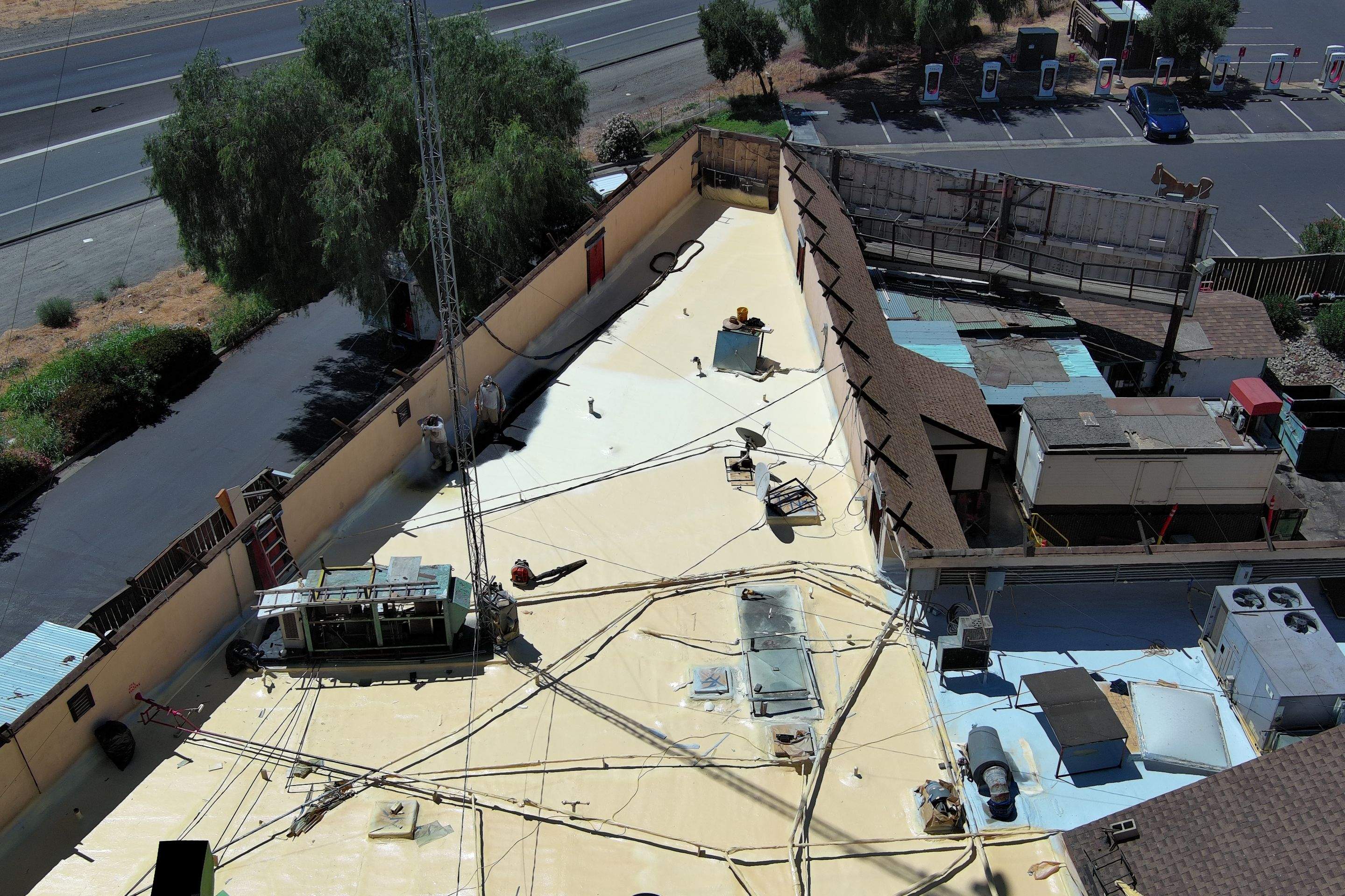 Spray foam and coatings using General Coatings acrylic coatings and spray foam by Straight Edge Roofing Inc