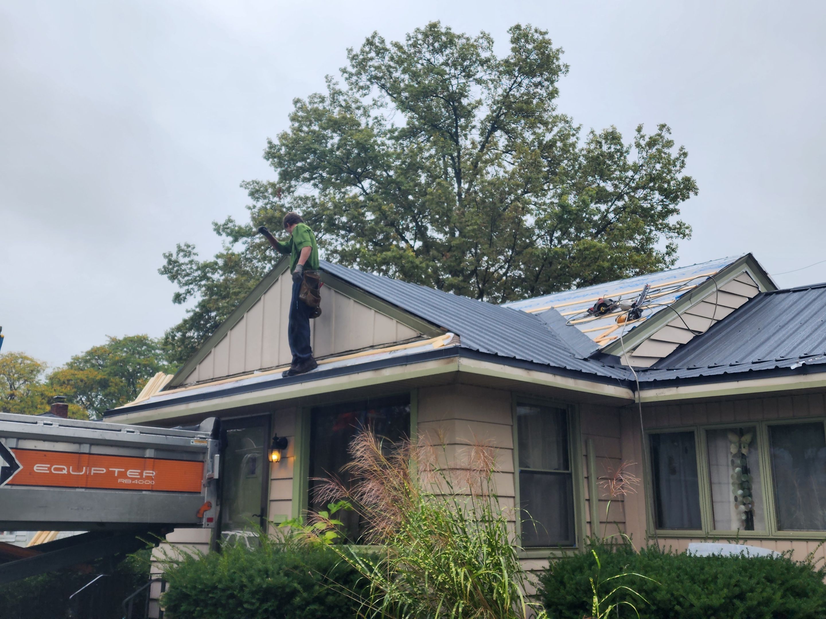 Residential Roofing Installation using Exposed Fastener Metal Roof by 4Ever Metal Roofing