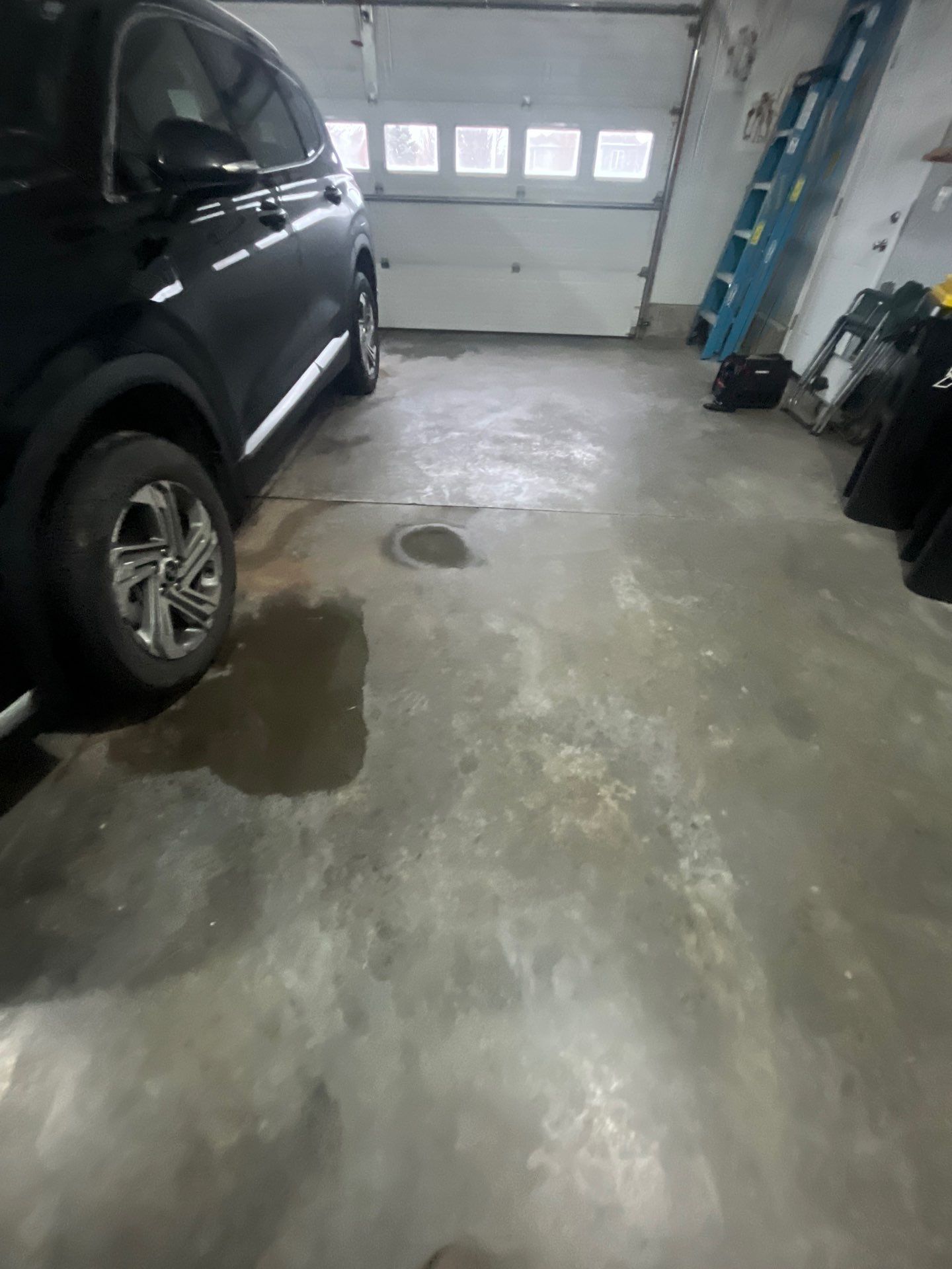 High-Gloss Epoxy Garage Floor Coating in Sioux Falls by Select Painting, Coatings & Garage Cabinets