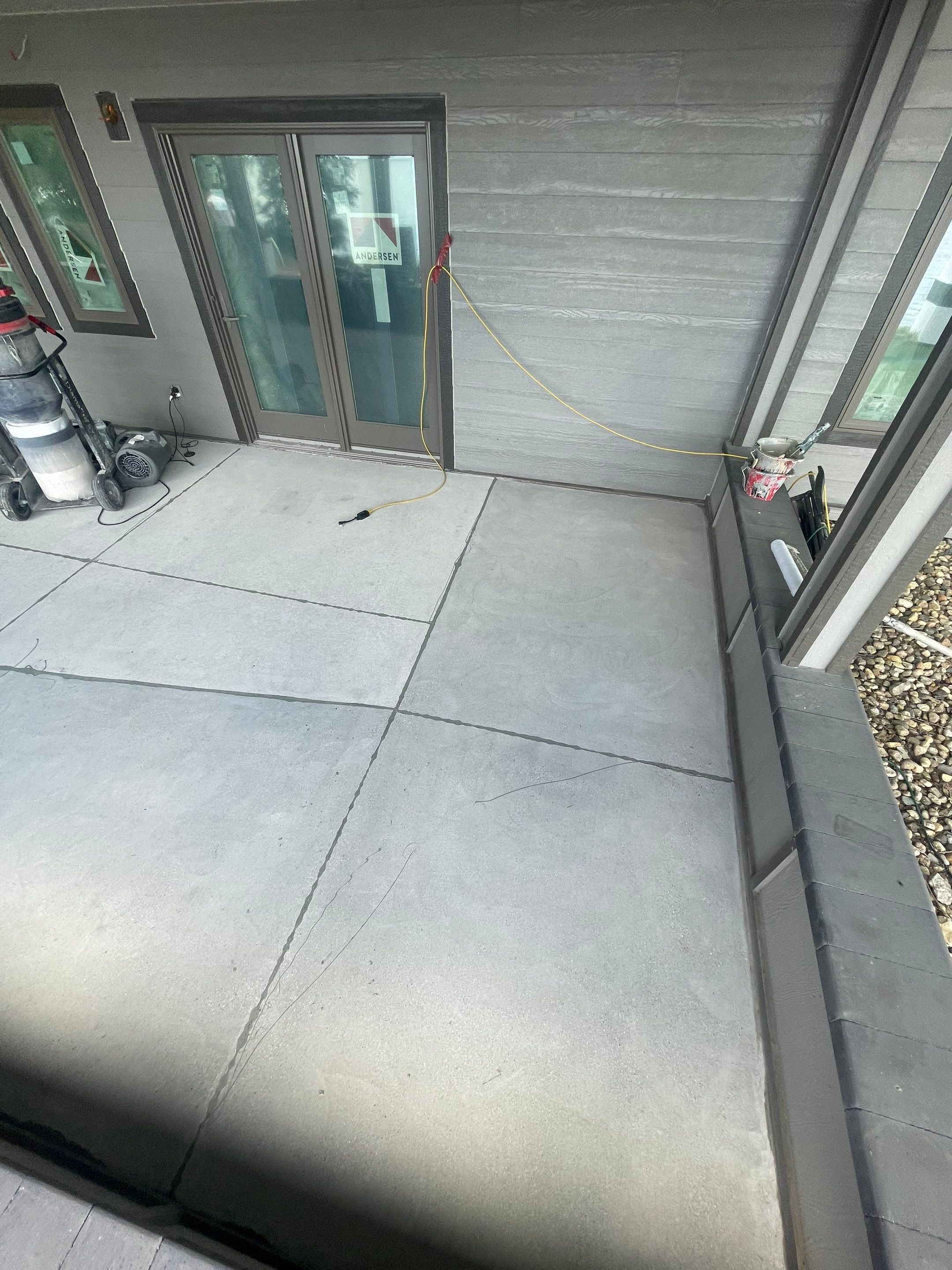 Lakefront Screened Patio Concrete Coating Installation in Wentworth by Select Painting, Coatings & Garage Cabinets