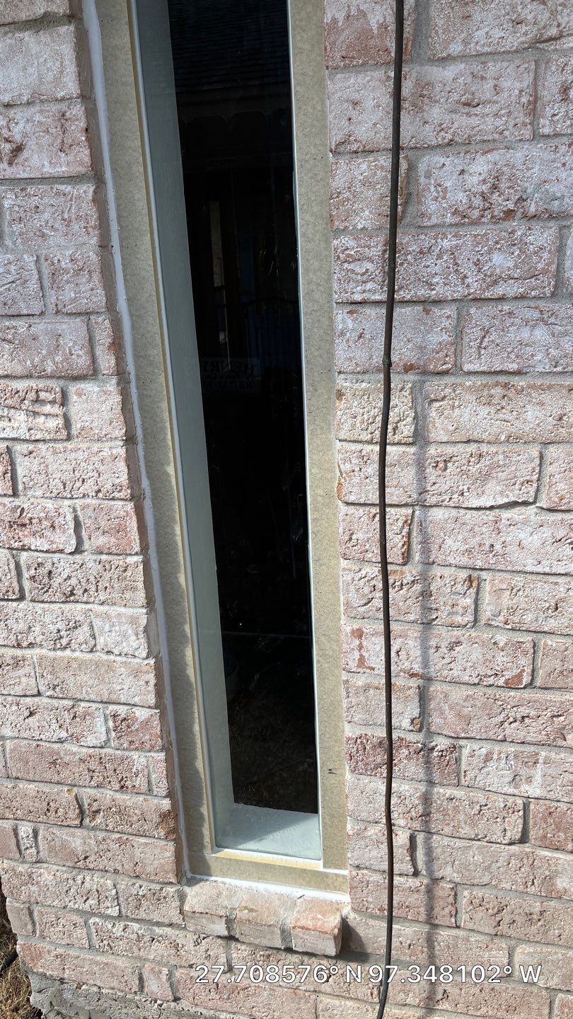 Colored Vinyl Windows to blend into brick by Bayfront Roofing and Construction