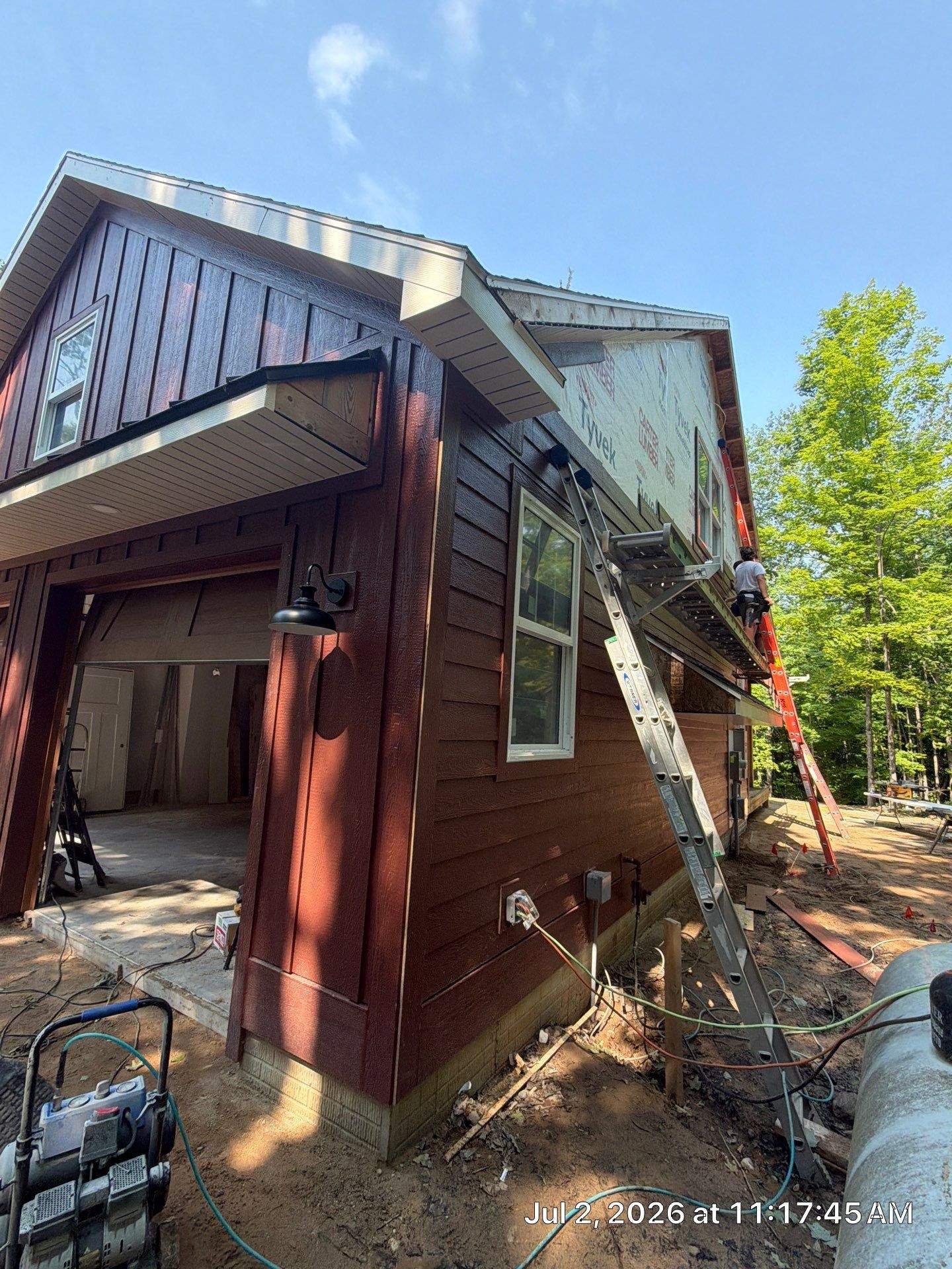 Gutter and Gutter Helmet Installation for Charlevoix Residential Project by Rainbow Seamless Systems