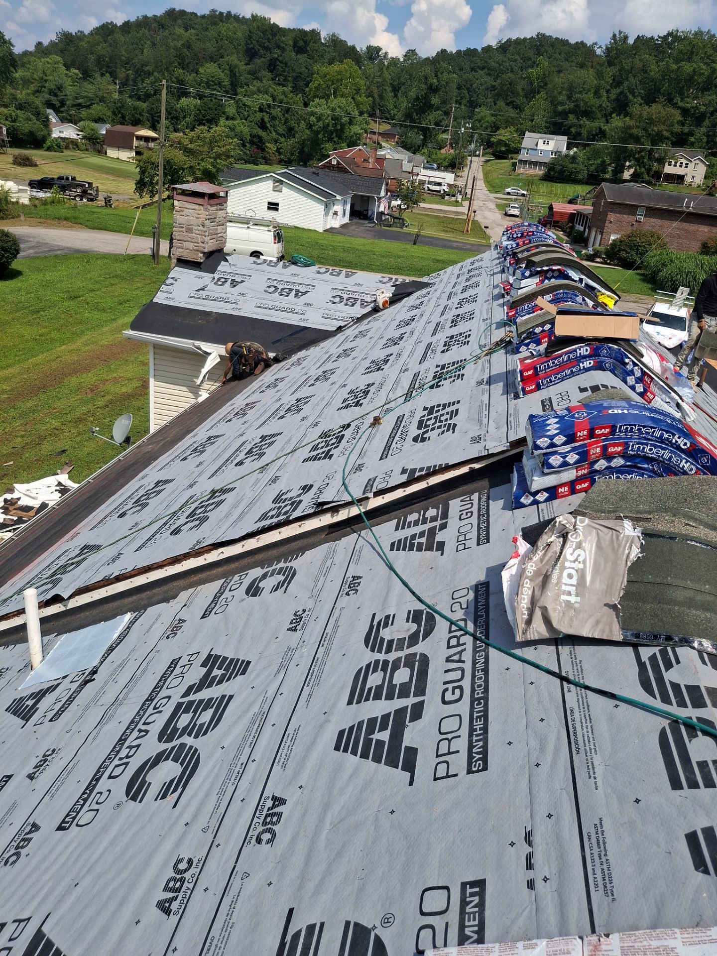 Residential Roofing Installation using GAF Timberline HDZ Weatherer Wood by Rainstoppers Roofing