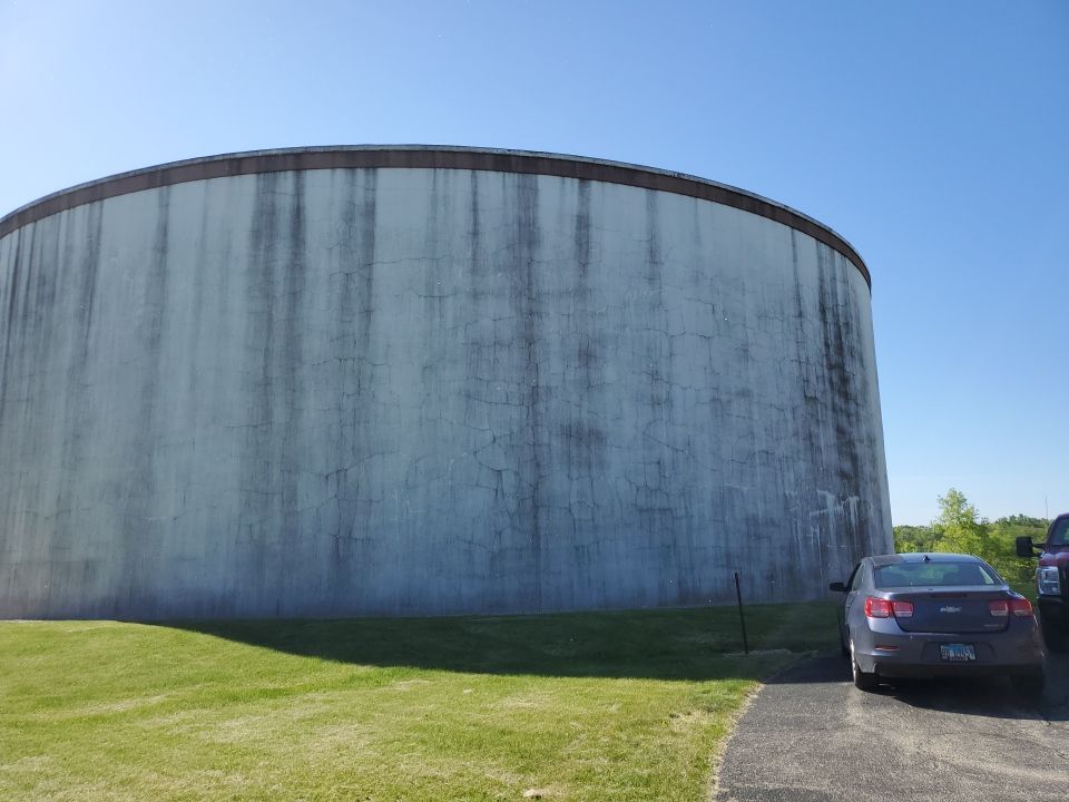 Water tank cleaning by Northern Power Washing LLC.
