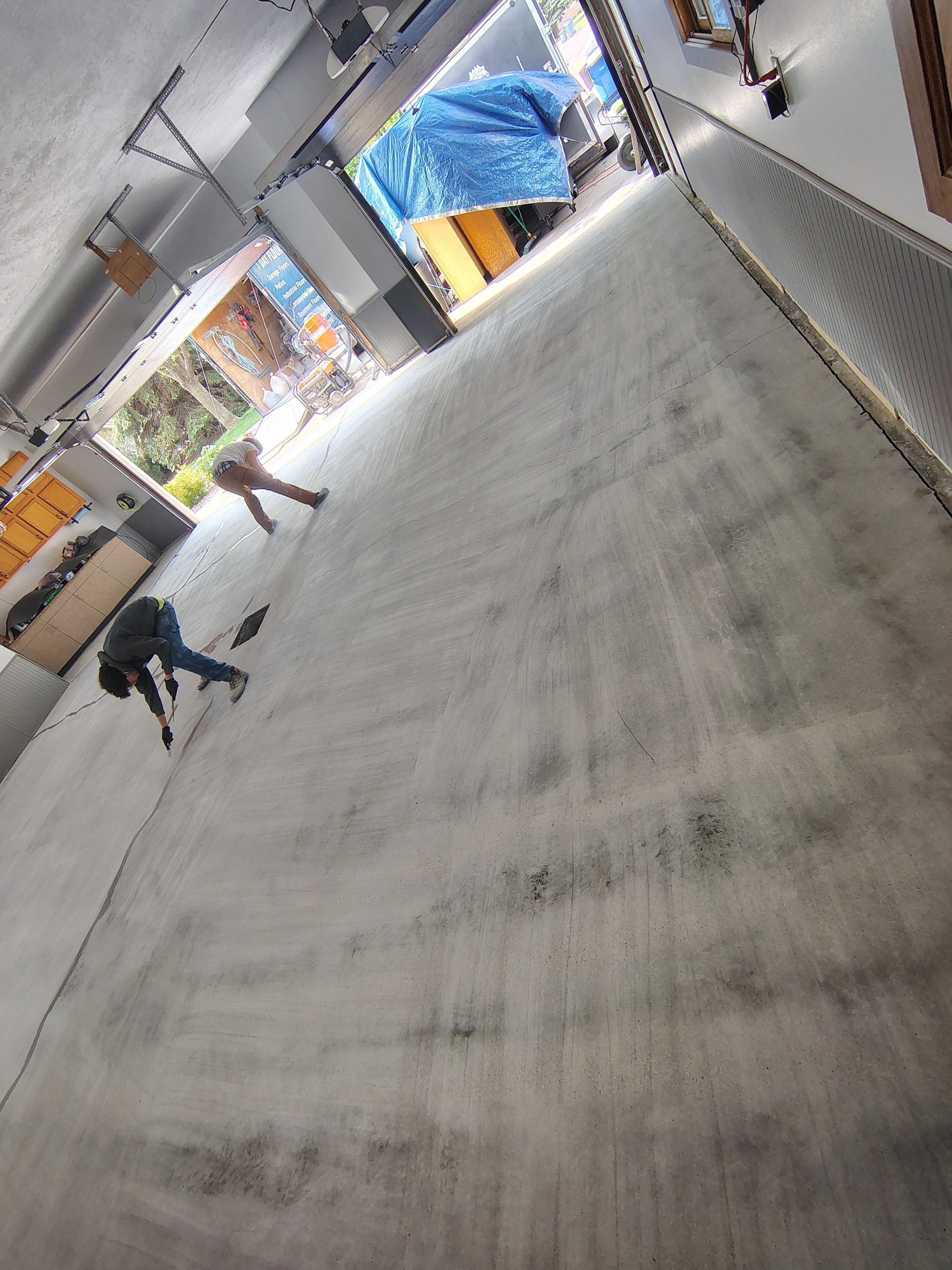 Multi-Fleck Epoxy Garage Floor Coating in Dell Rapids by Select Painting, Coatings & Garage Cabinets