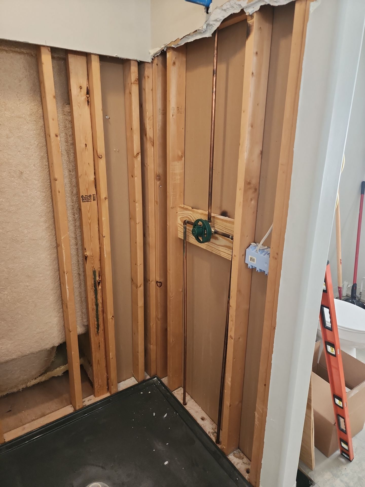 Master Bathroom Renovation Featuring Dark Textured Shower Panels in Branson West by Kitchen Works LLC
