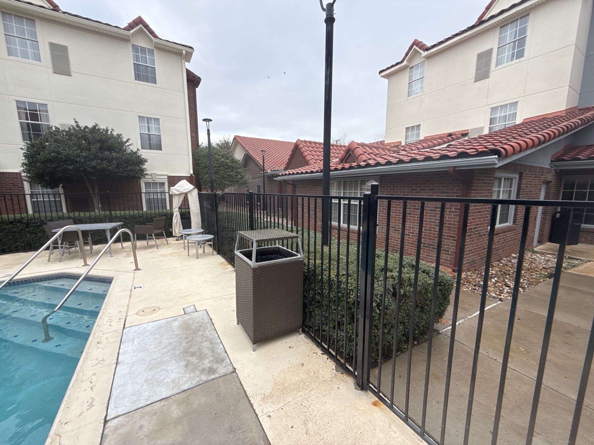 5' Wrought iron fencing w/ 10' vinyl chainlink by Grizzly Fence And Patio